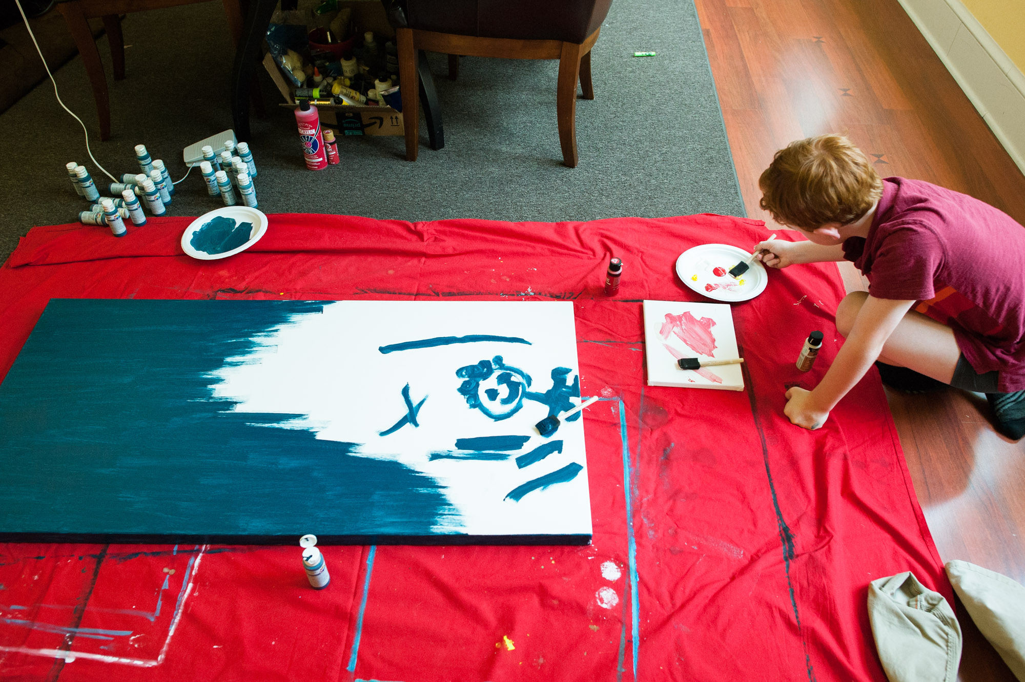 boy painting - documentary family photography