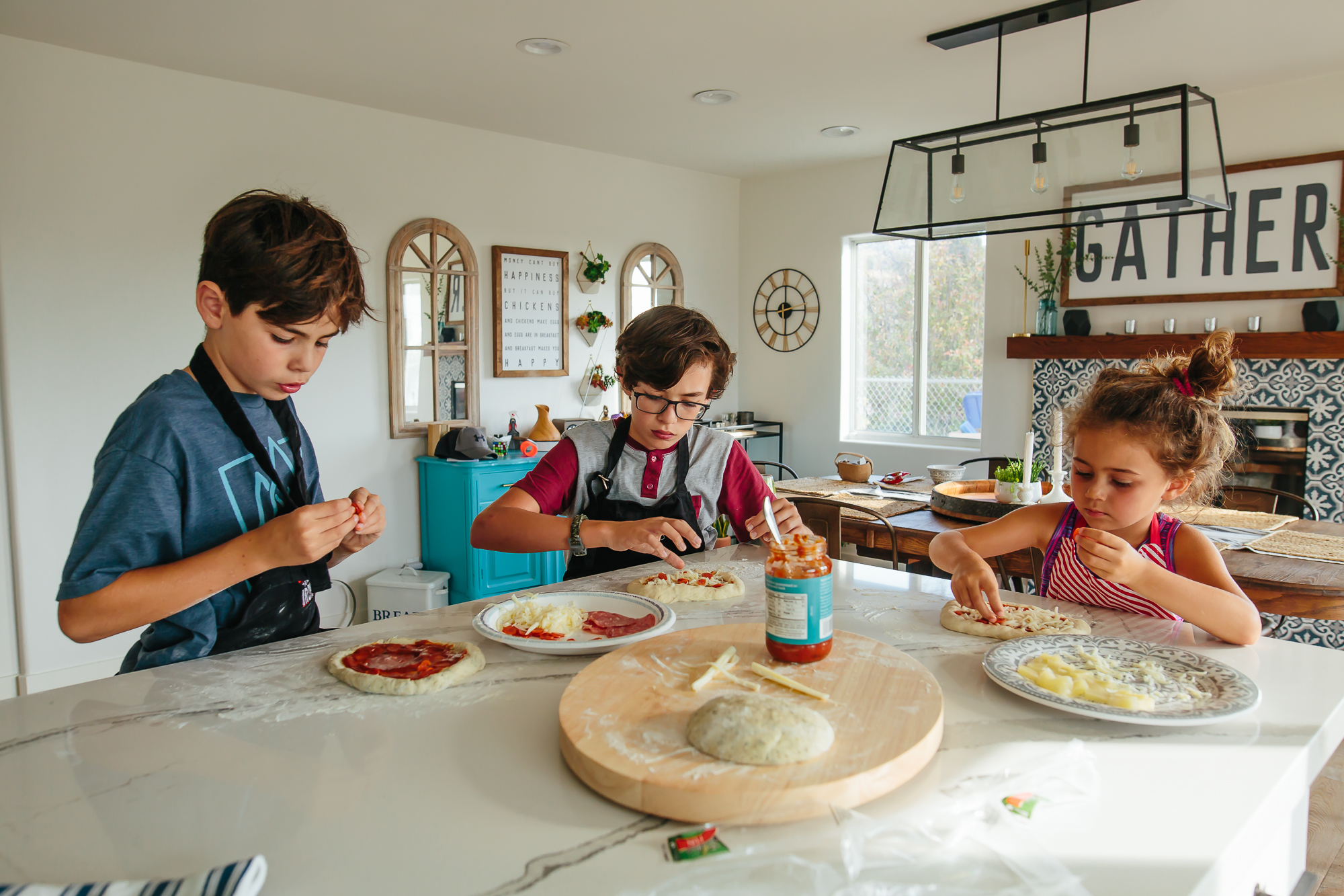 kids eating lunch at kitchen counter - documentary family photography