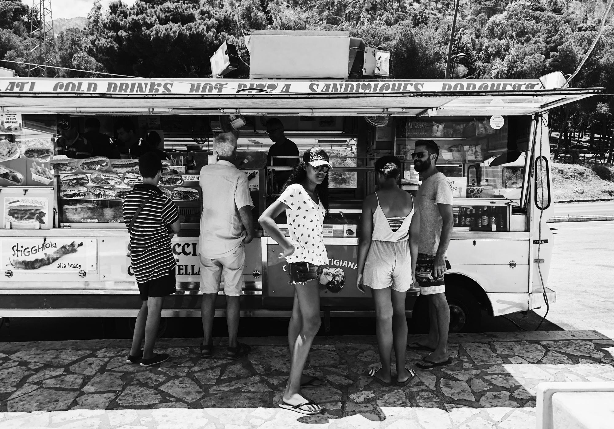 girls wait at food truck - documentary family photography