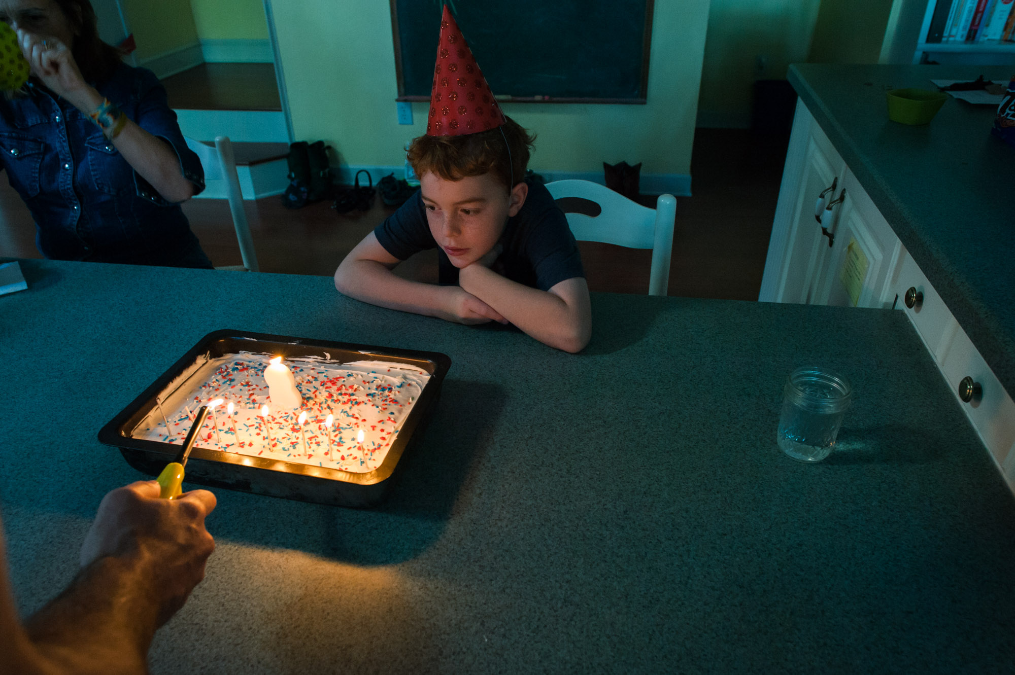 boy and birthday cake - documentary family photography