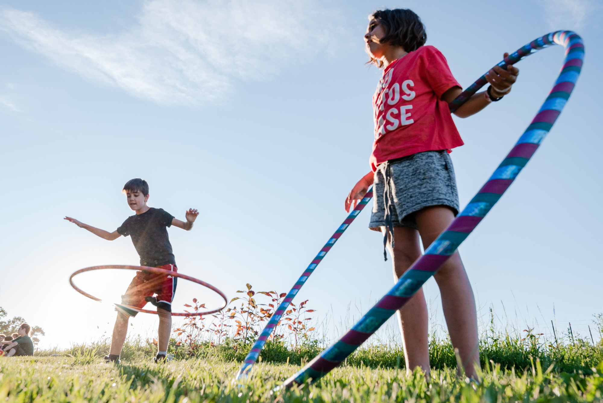 kids hula hooping - documentary family photography
