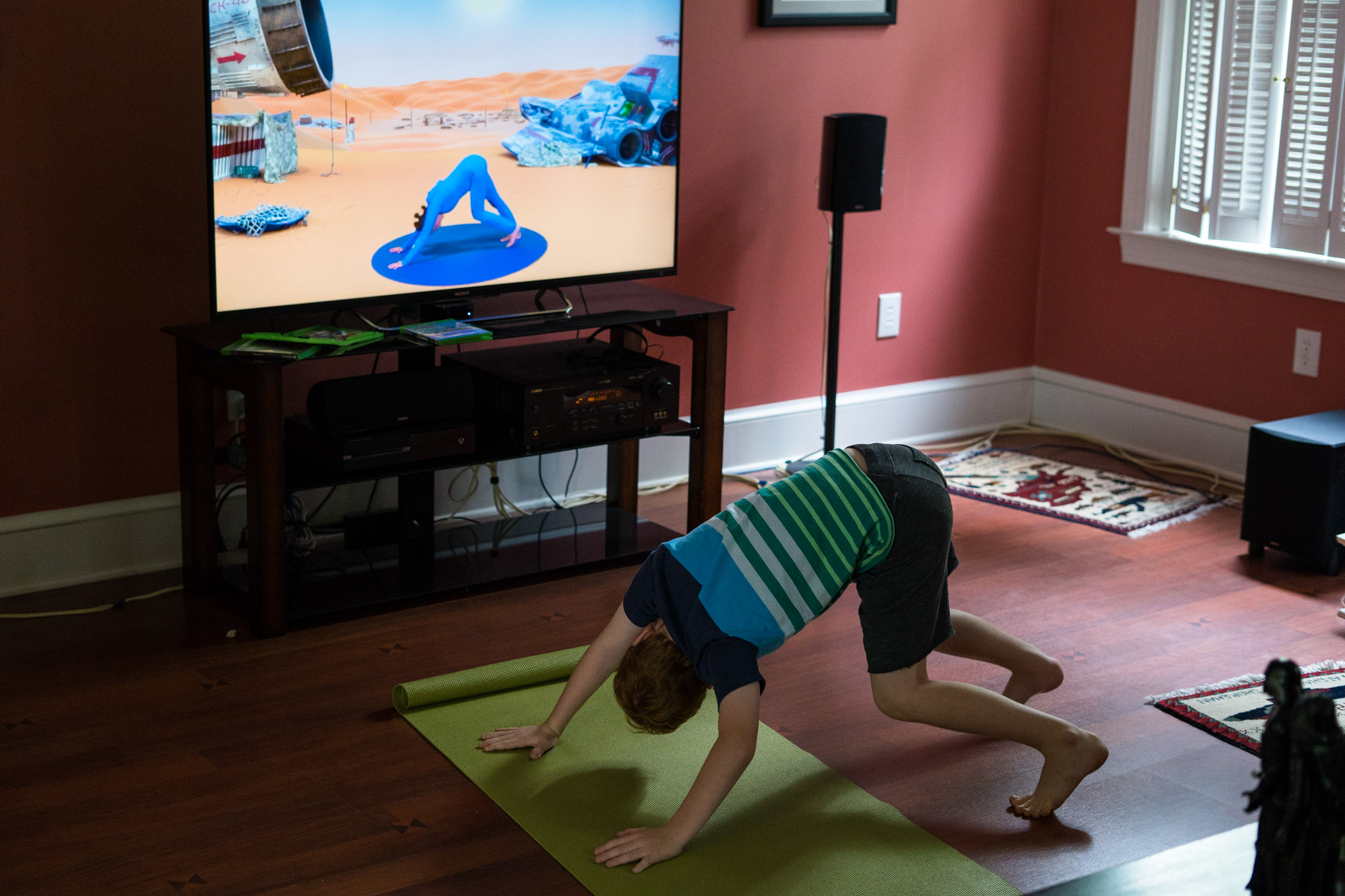 boy practicing yoga - documentary family photography