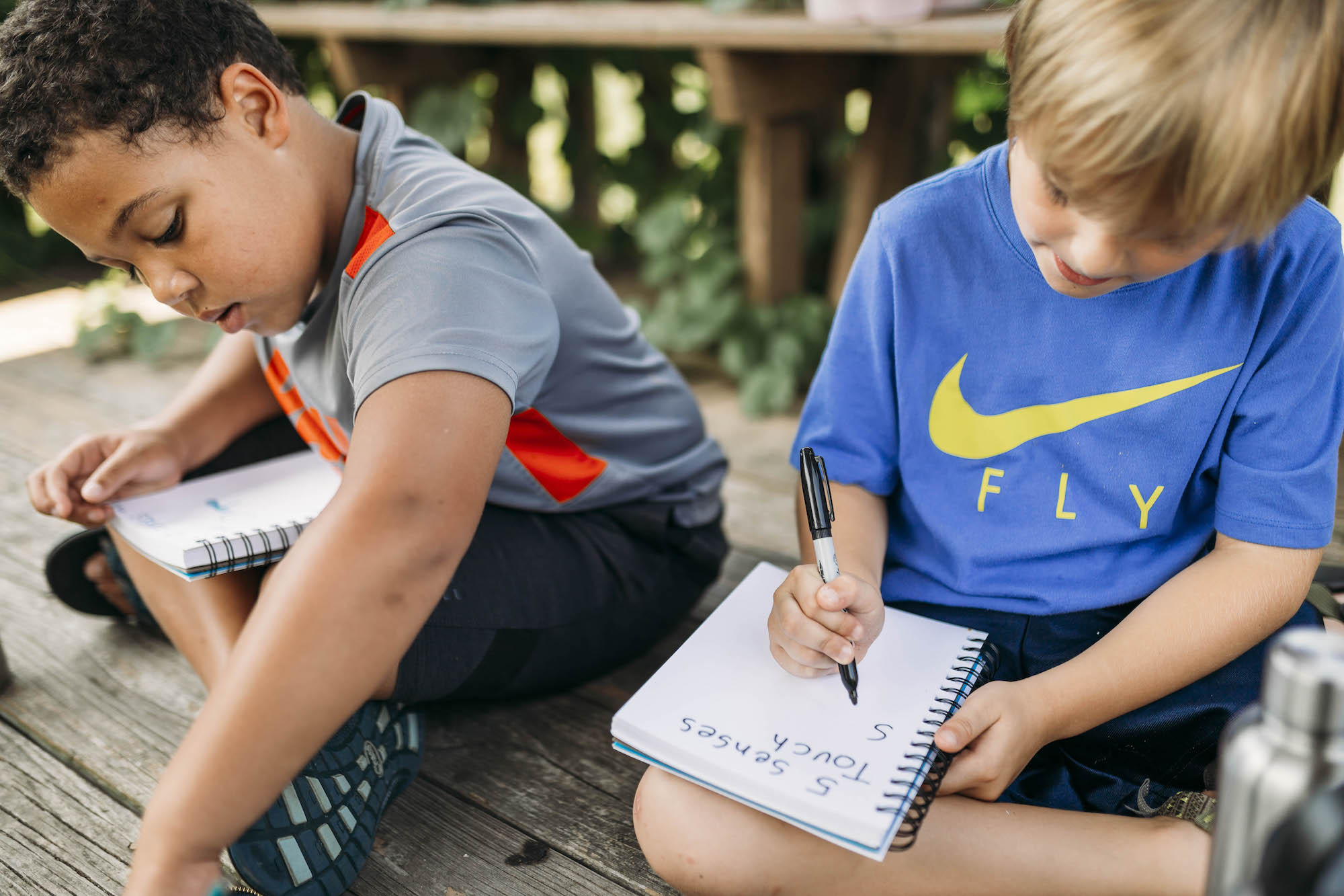 boys doing school work - documentary family photography