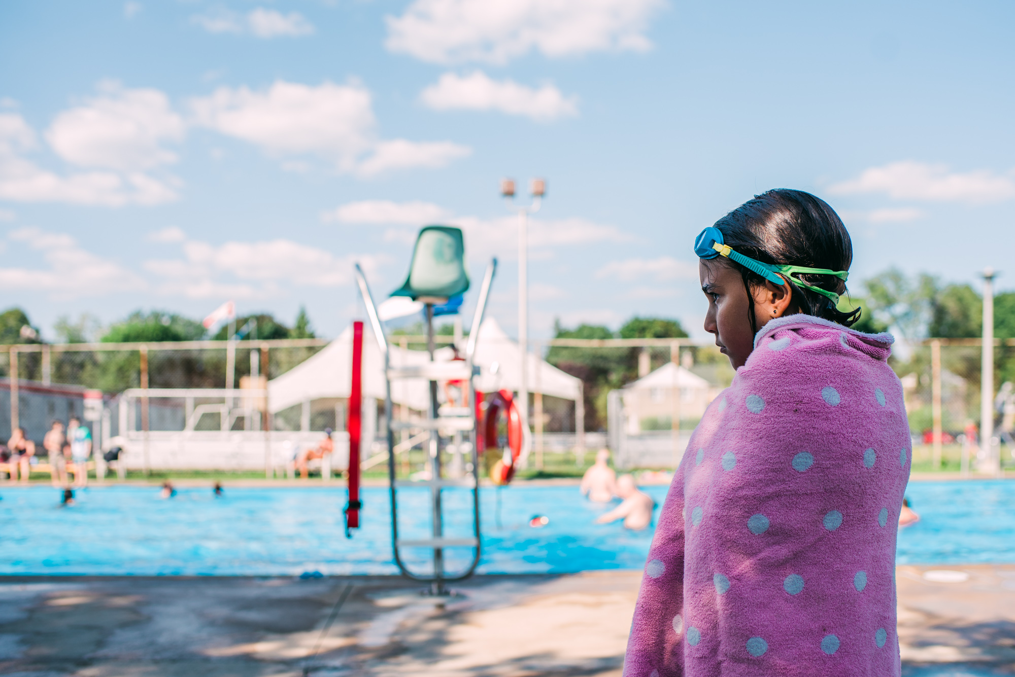 girl in towel at public pool - documentary family photography