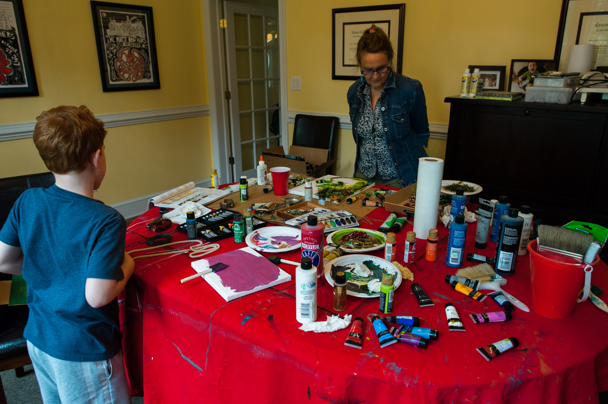 boy with crafts on table - documentary family photography