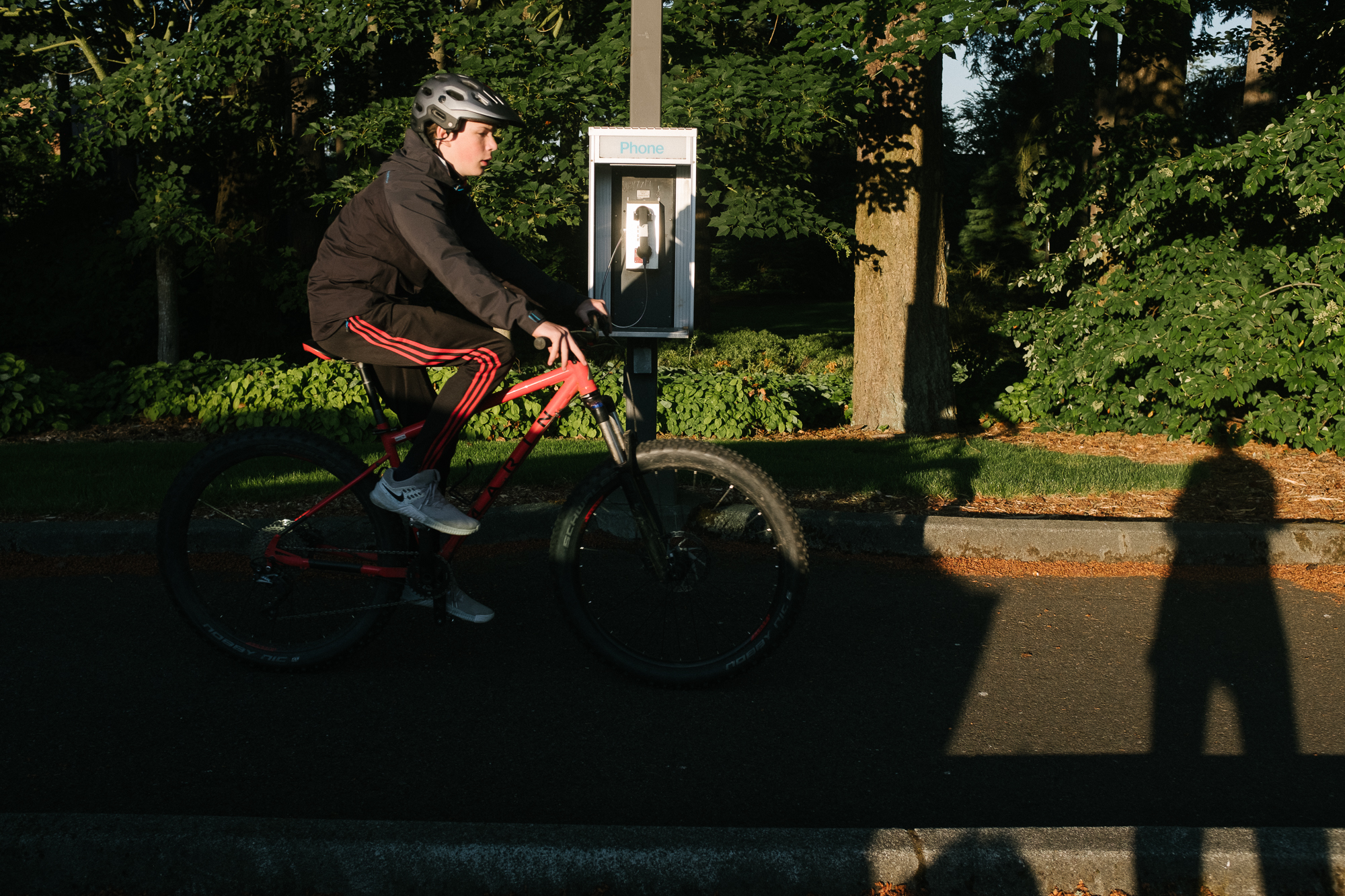 boy on bike - documentary family photography