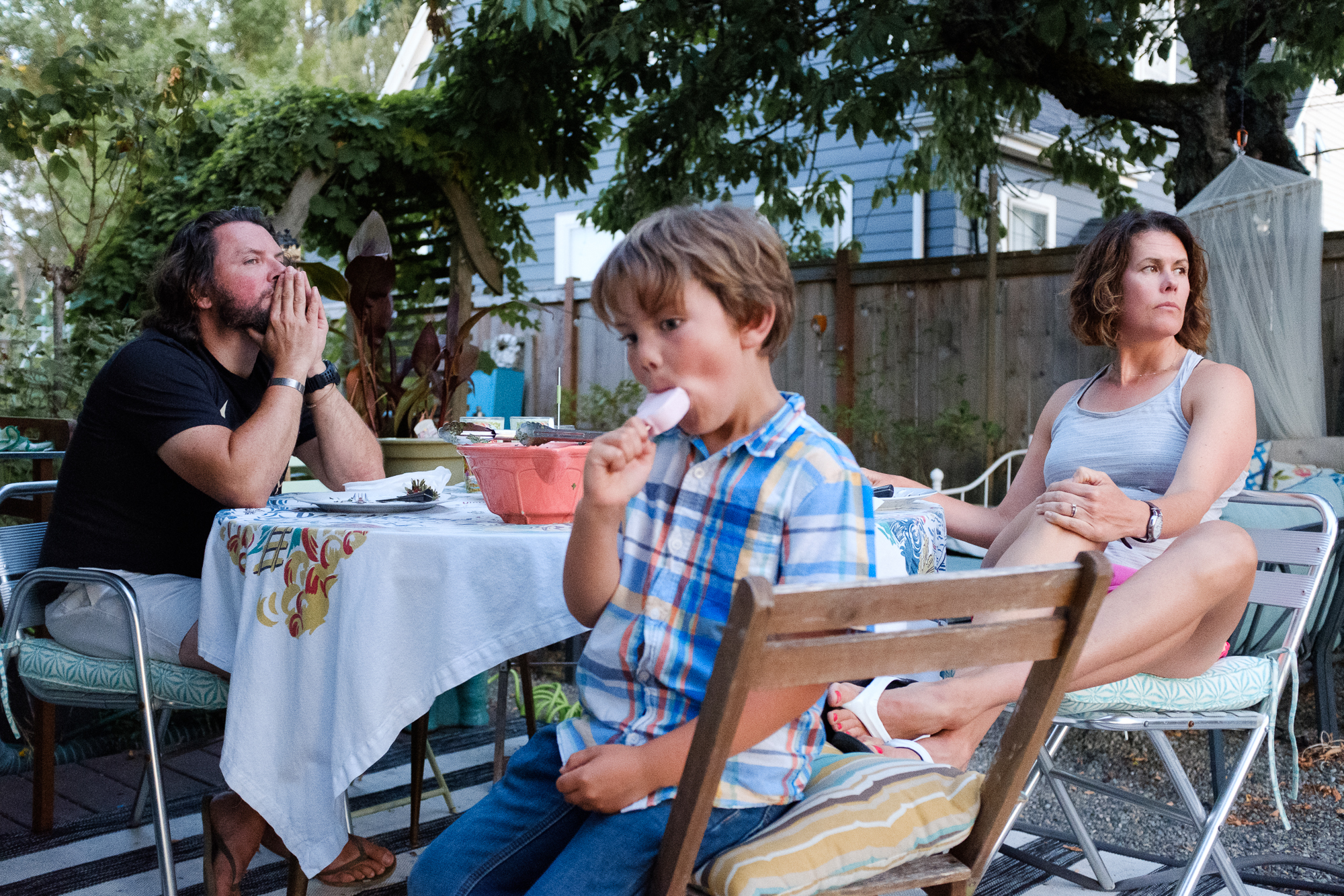 boy eating ice cream bar - documentary family photography