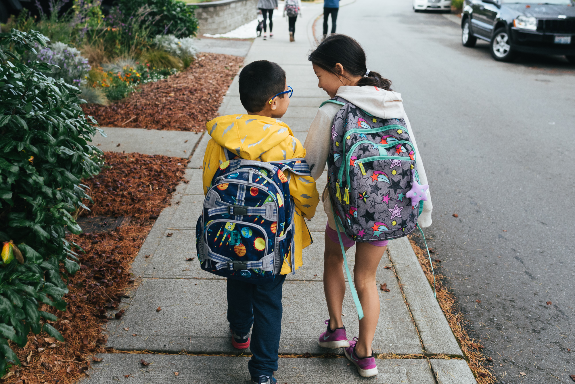 kids with backpacks - documentary family photography