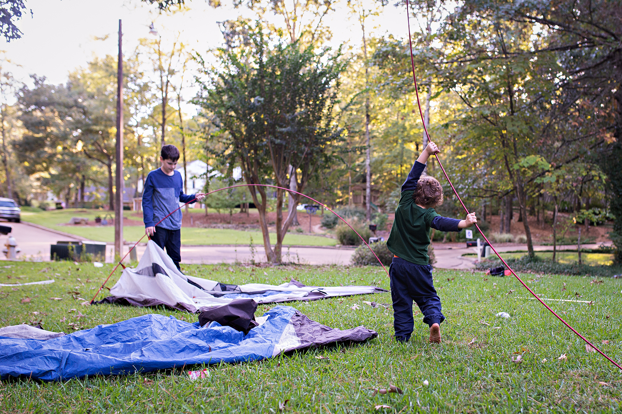 kids pitching tents - documentary family photography