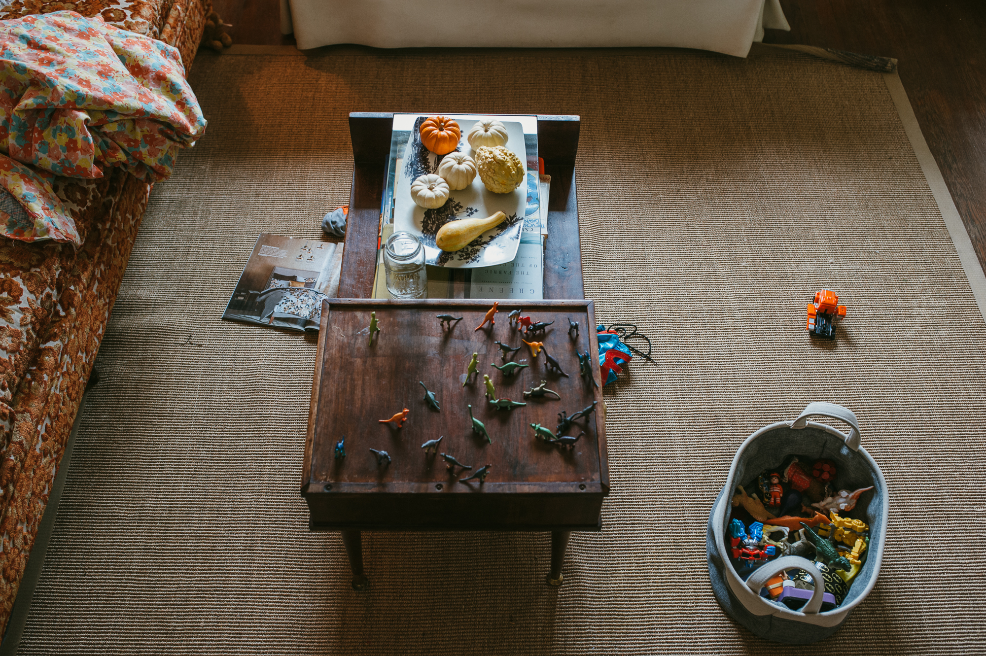 table with toys and fruit - documentary family photography