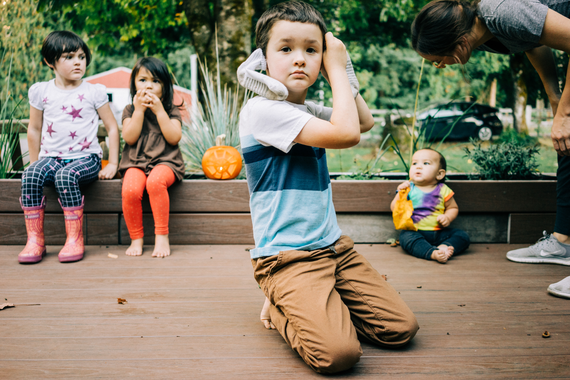 boy with socks on ears - documentary family photography