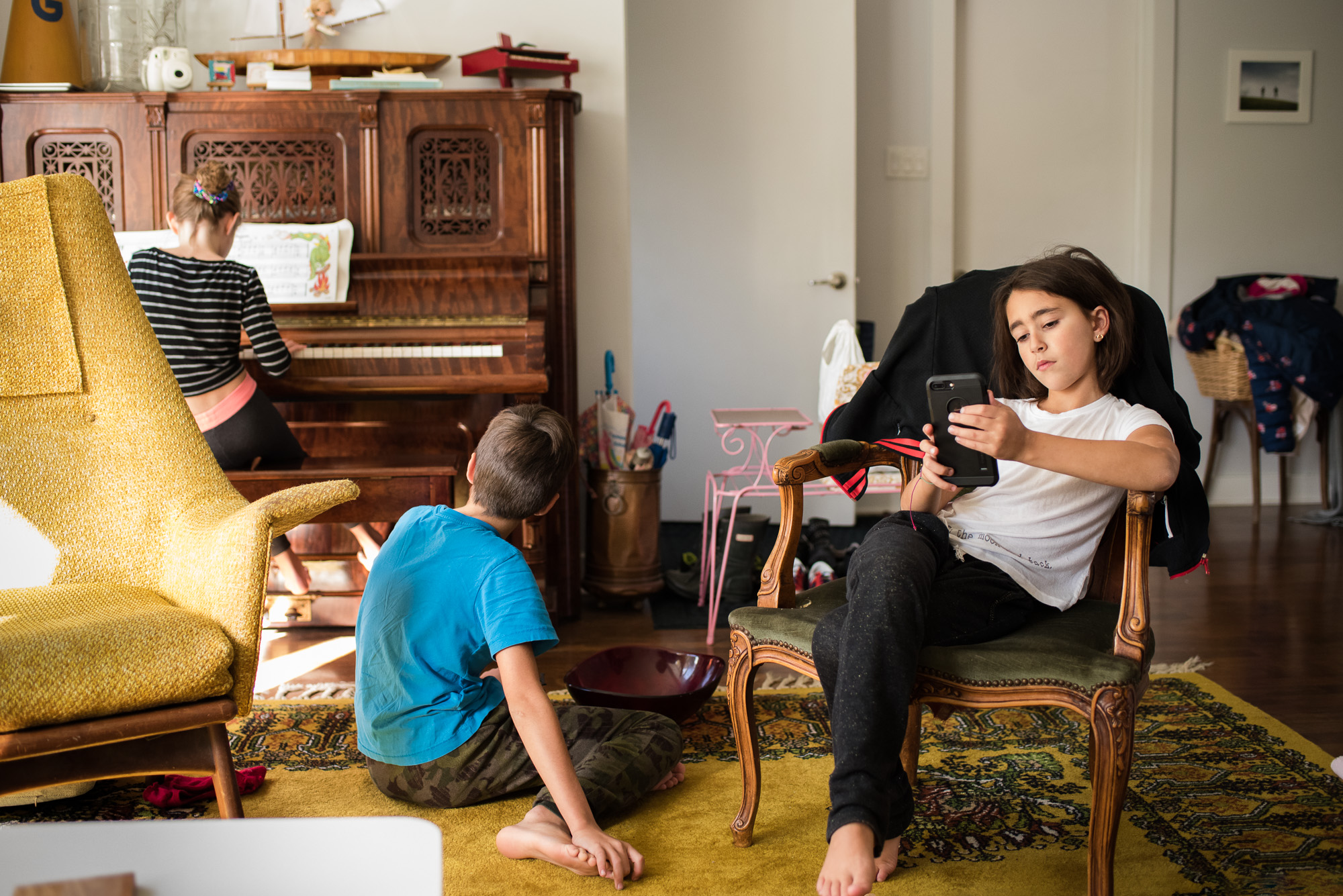 kids lounging in living room - documentary family photography