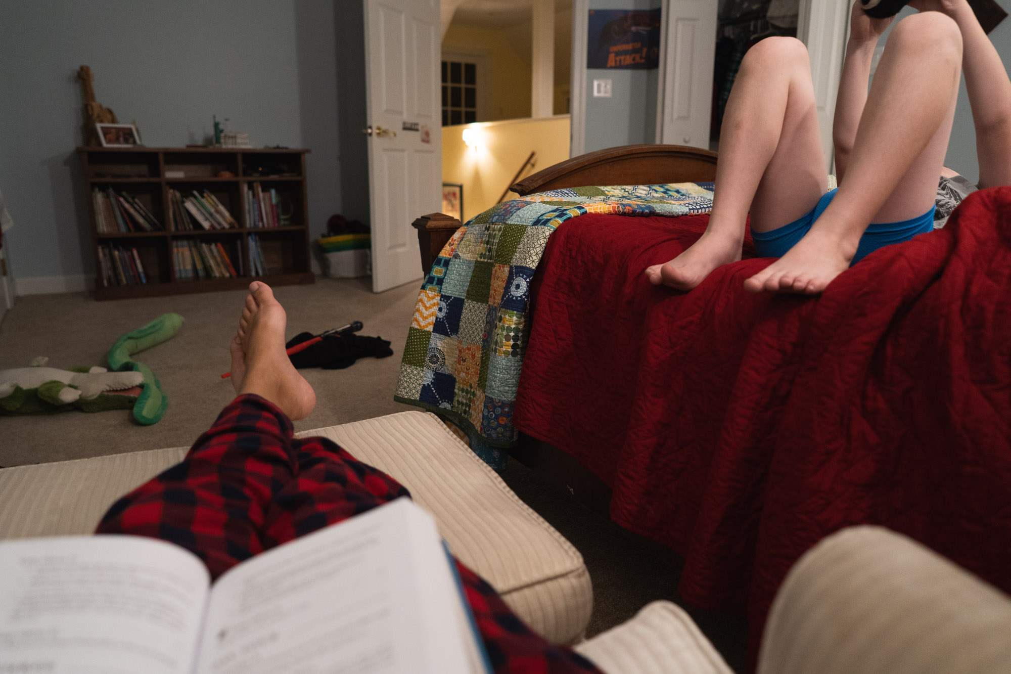 family feet while reading - documentary family photography