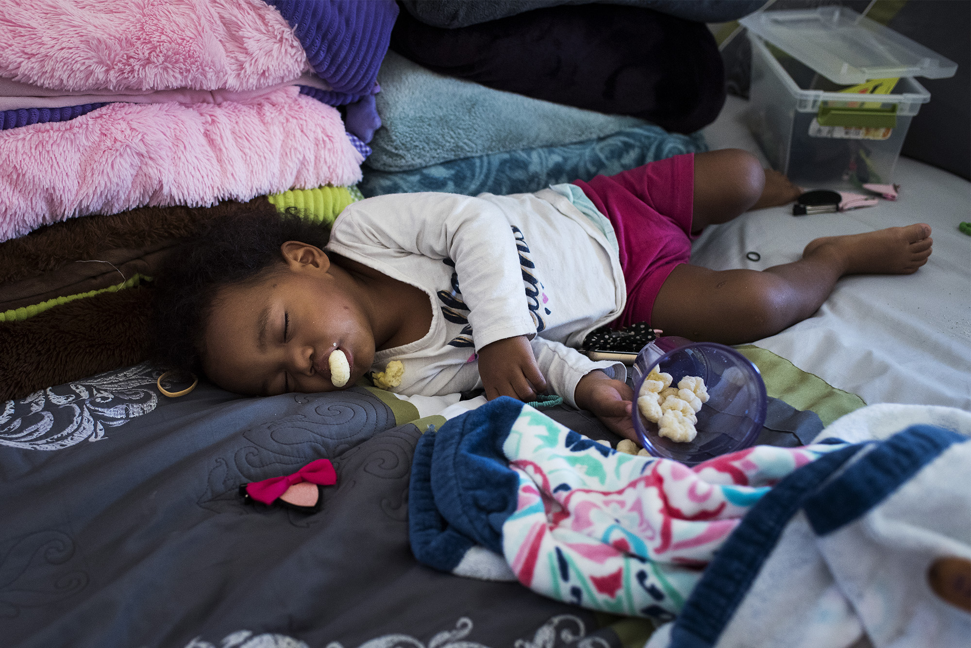 girl asleep mid snack - documentary family photography