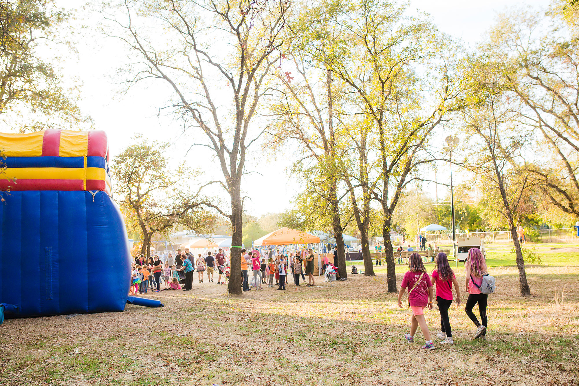 kids gather at bounce house - documentary family photography