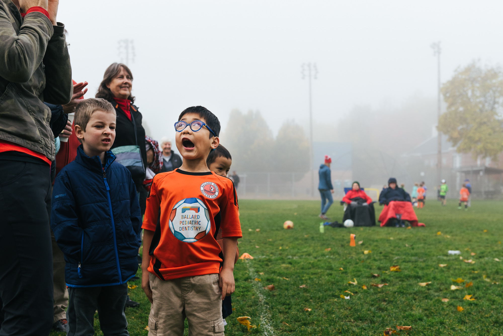boy screams in fog - documentary family photography