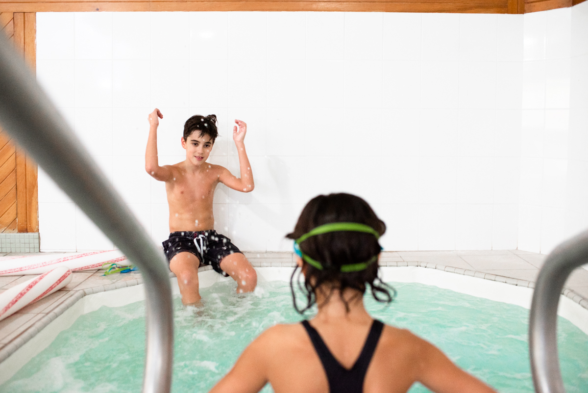 kids in hot tub - documentary family photography