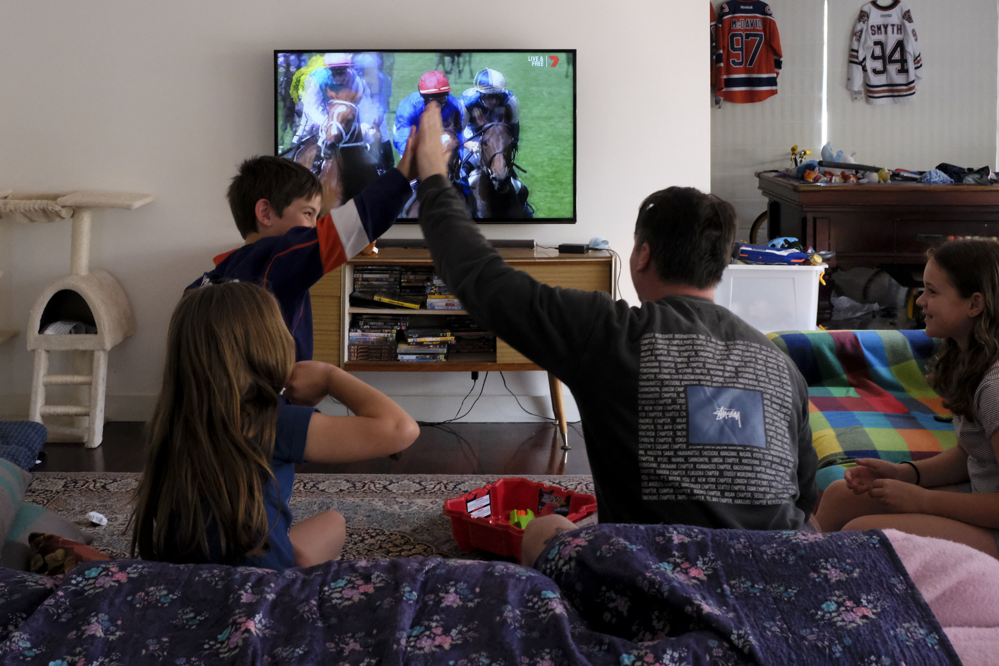 father son high five - documentary family photography