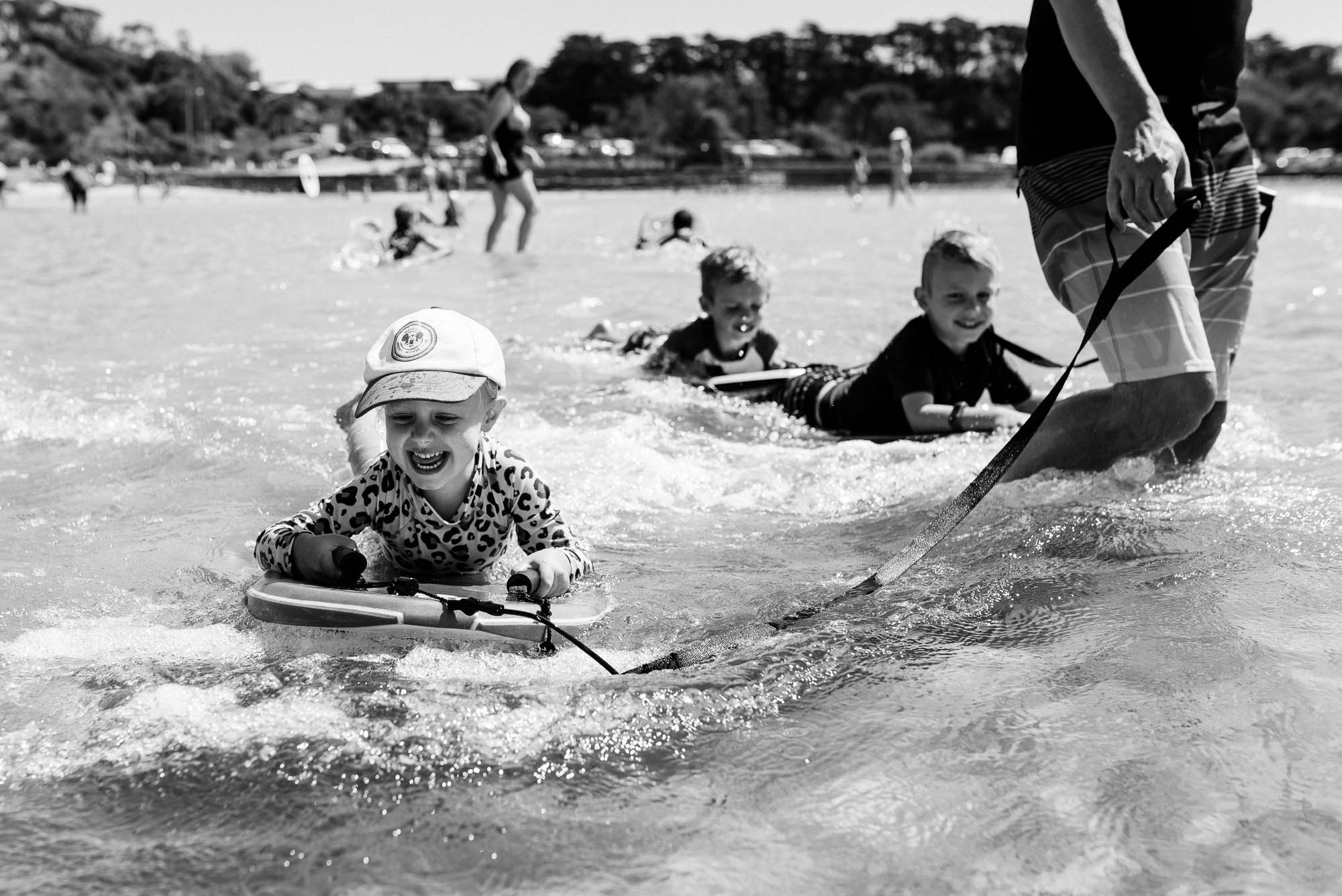 kids on wake boards - documentary family photography