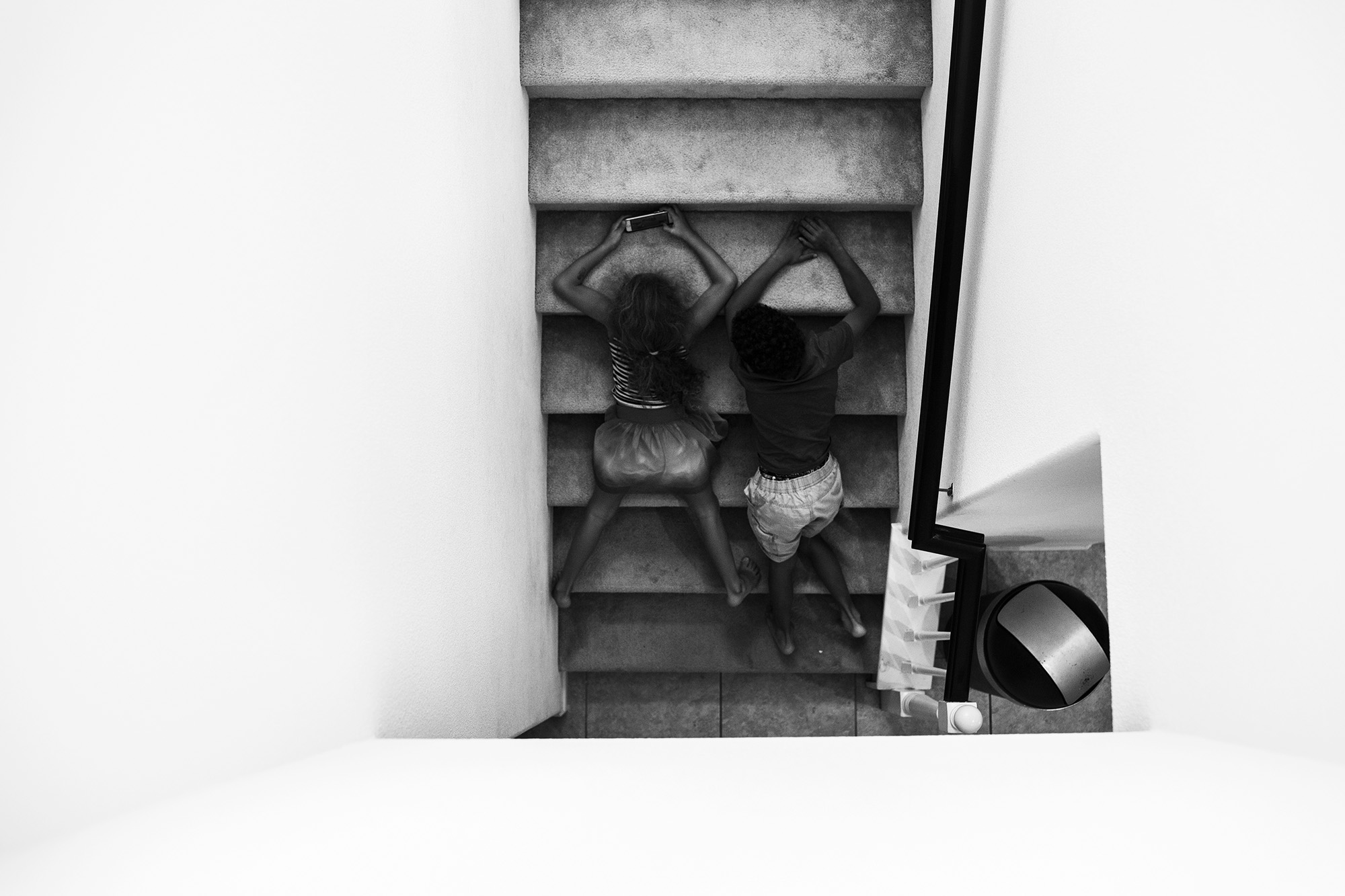 kids on stairs - documentary family photography 