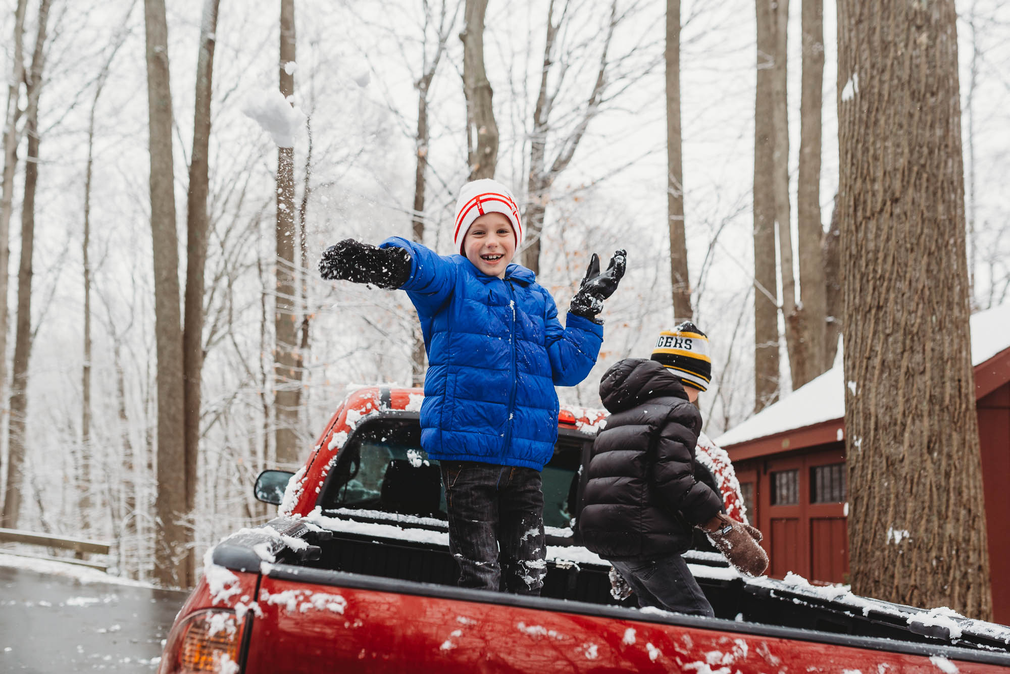 kids throwing snow - documentary family photography