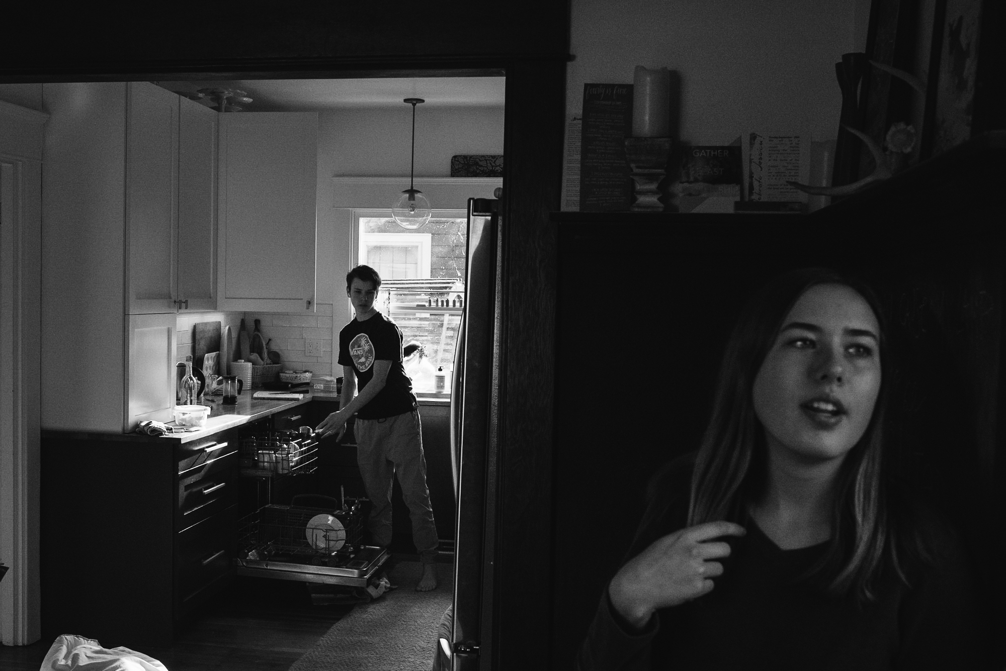 brother and sister in house - documentary family photography