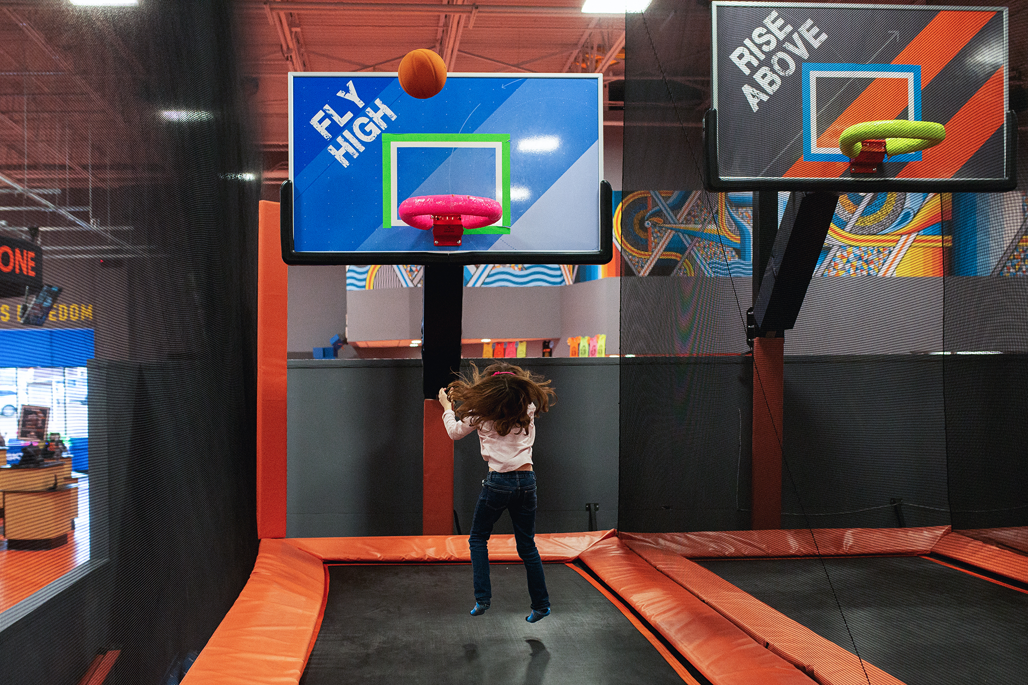 girl at trampoline park - documentary family photography