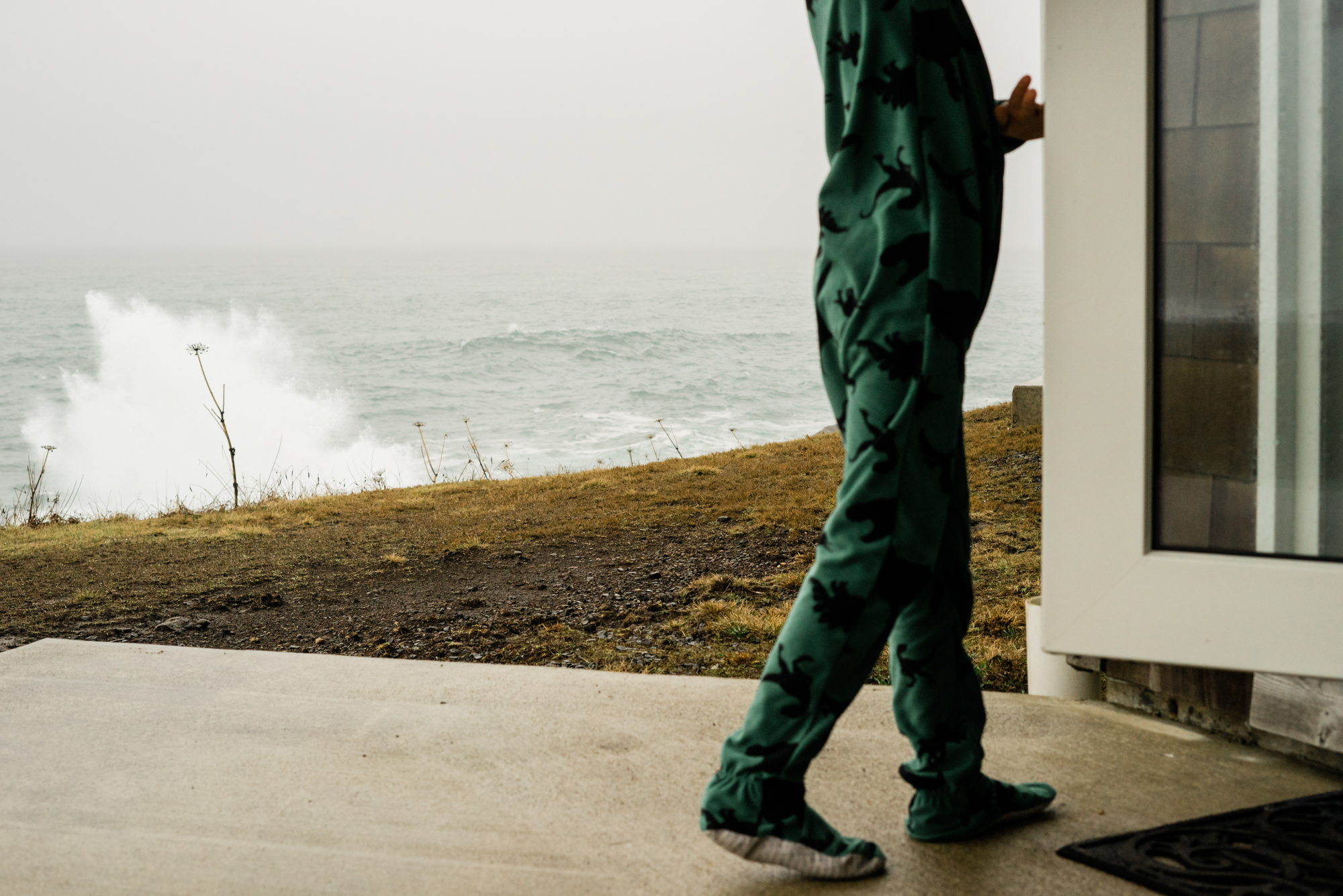 kid in pajamas at beach - documentary family photography