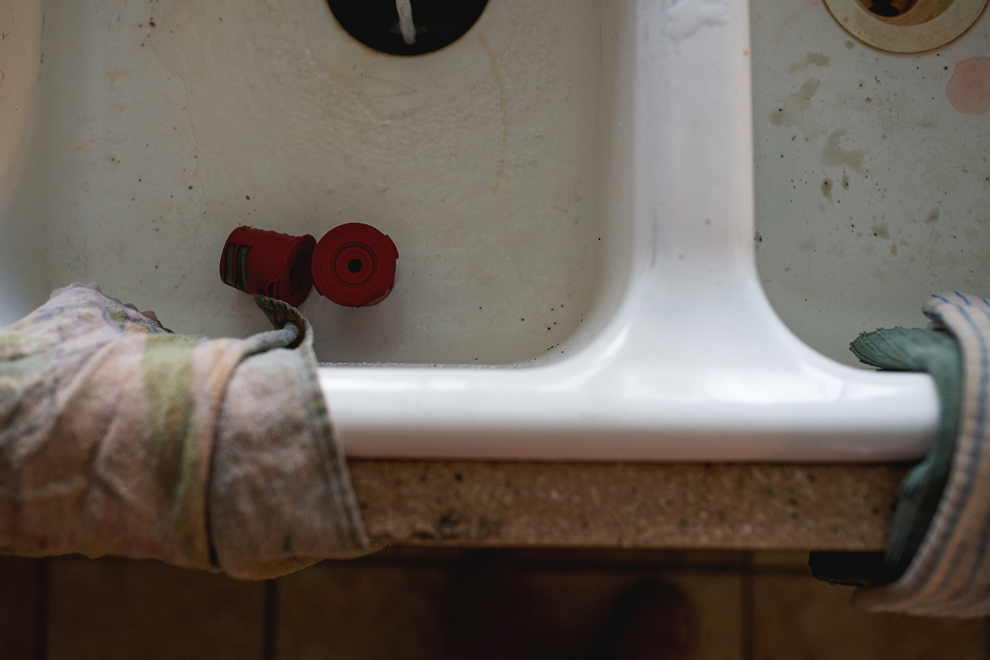 rags in sink - documentary family photography