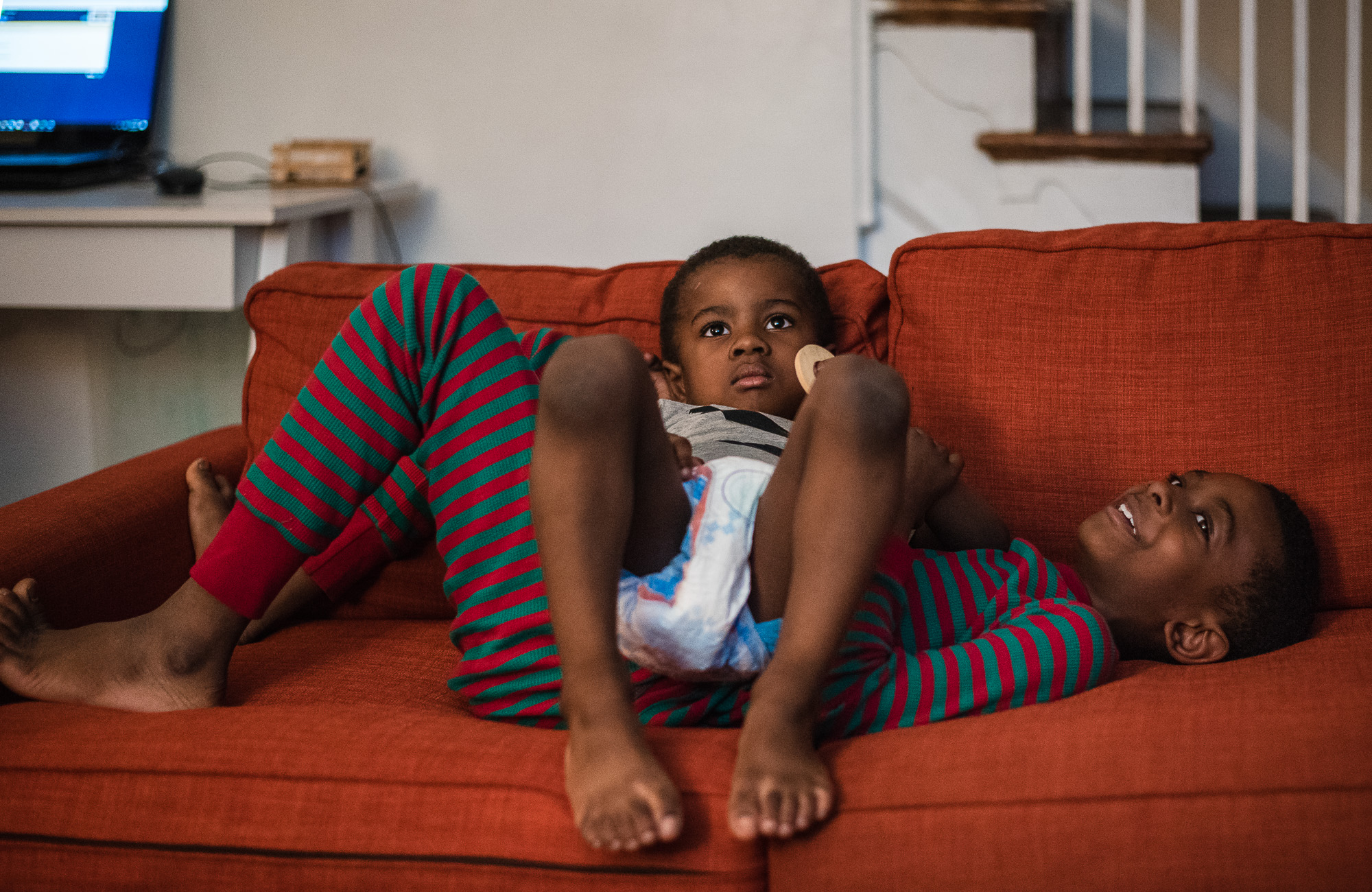 boys on couch - documentary family photography