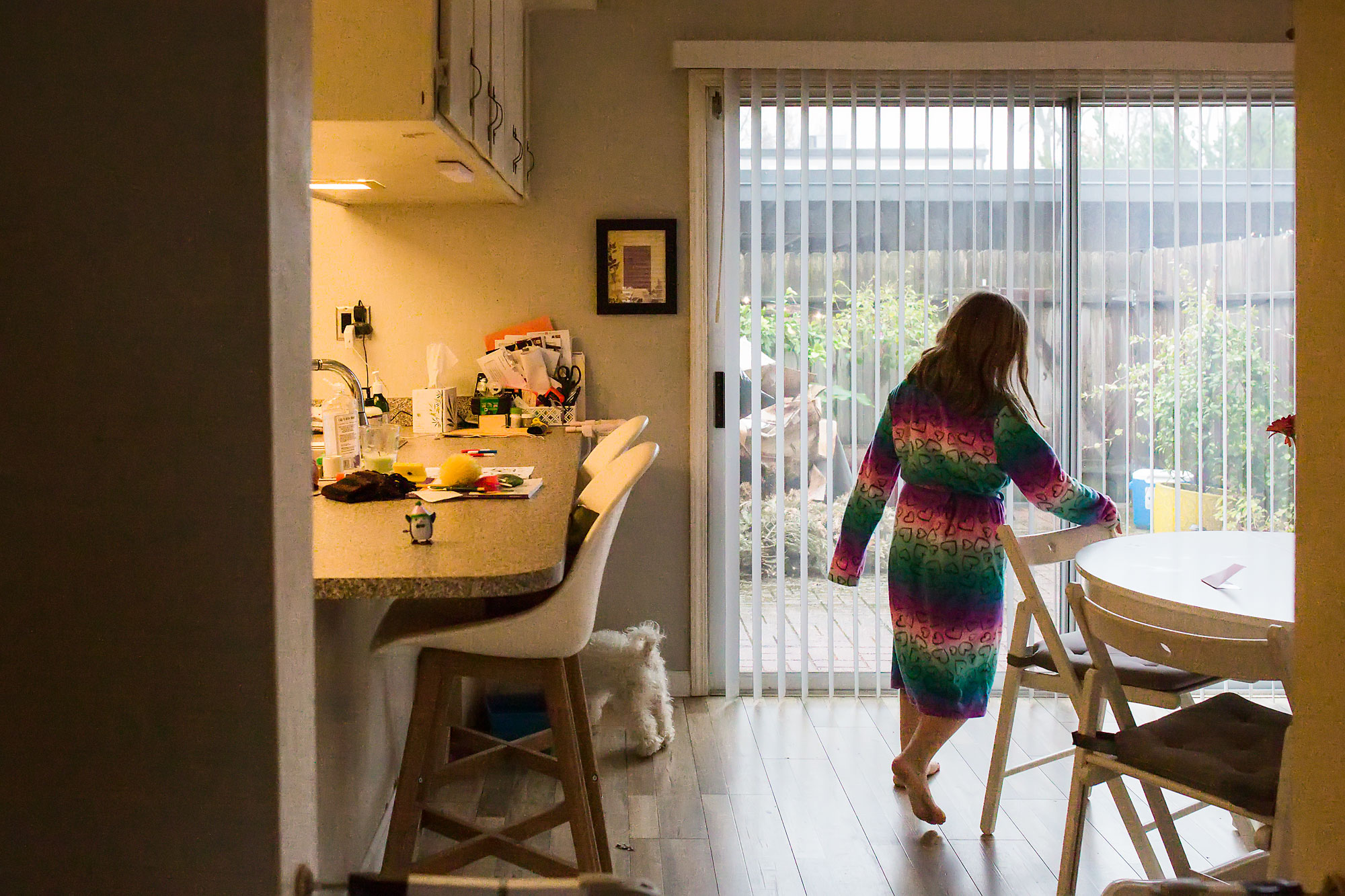 girl in rainbow bathrobe - documentary family photography