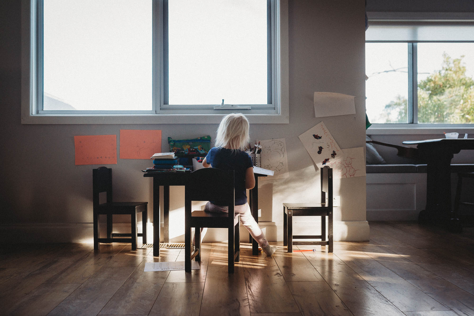 girl at table - documentary family photography