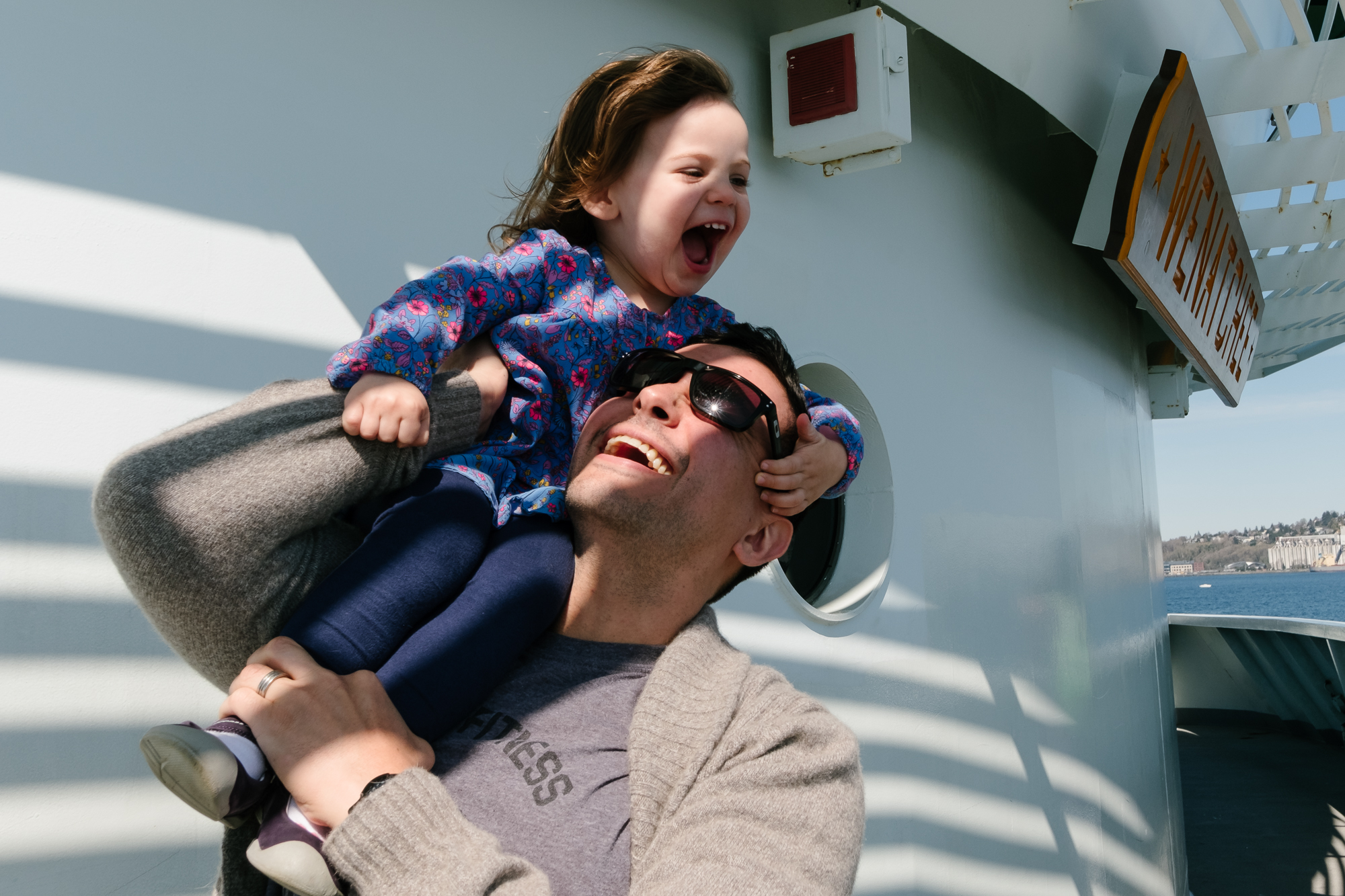 father and daughter on ferry - documentary family photography
