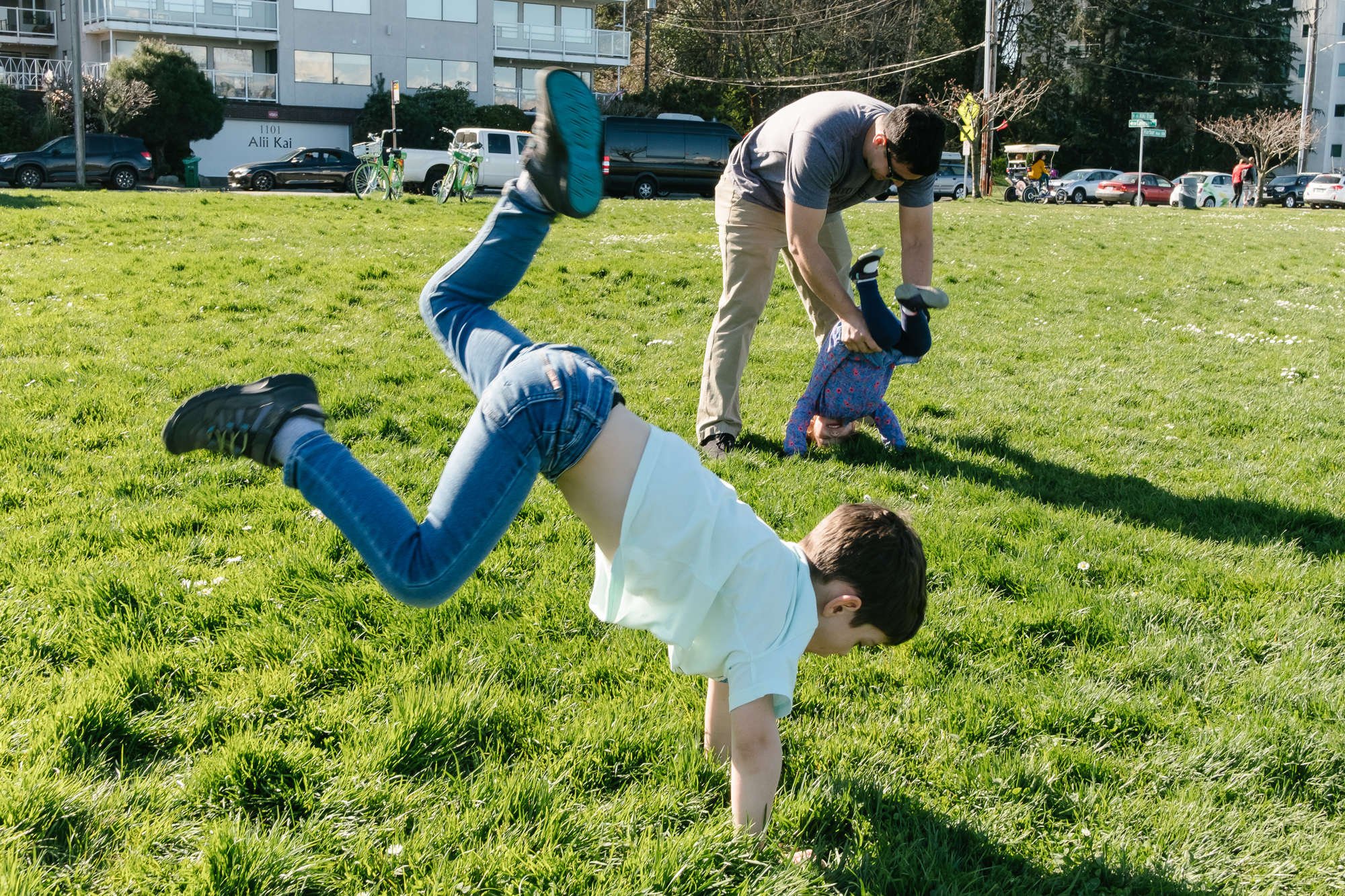 boy trying hand stand - documentary family photography