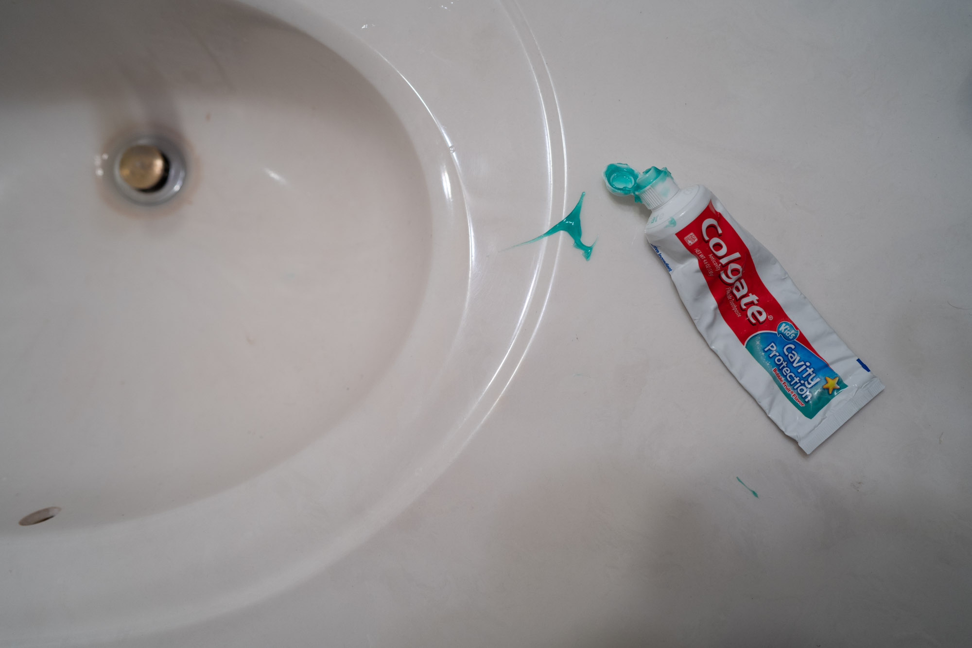 toothpaste on sink - documentary family photography
