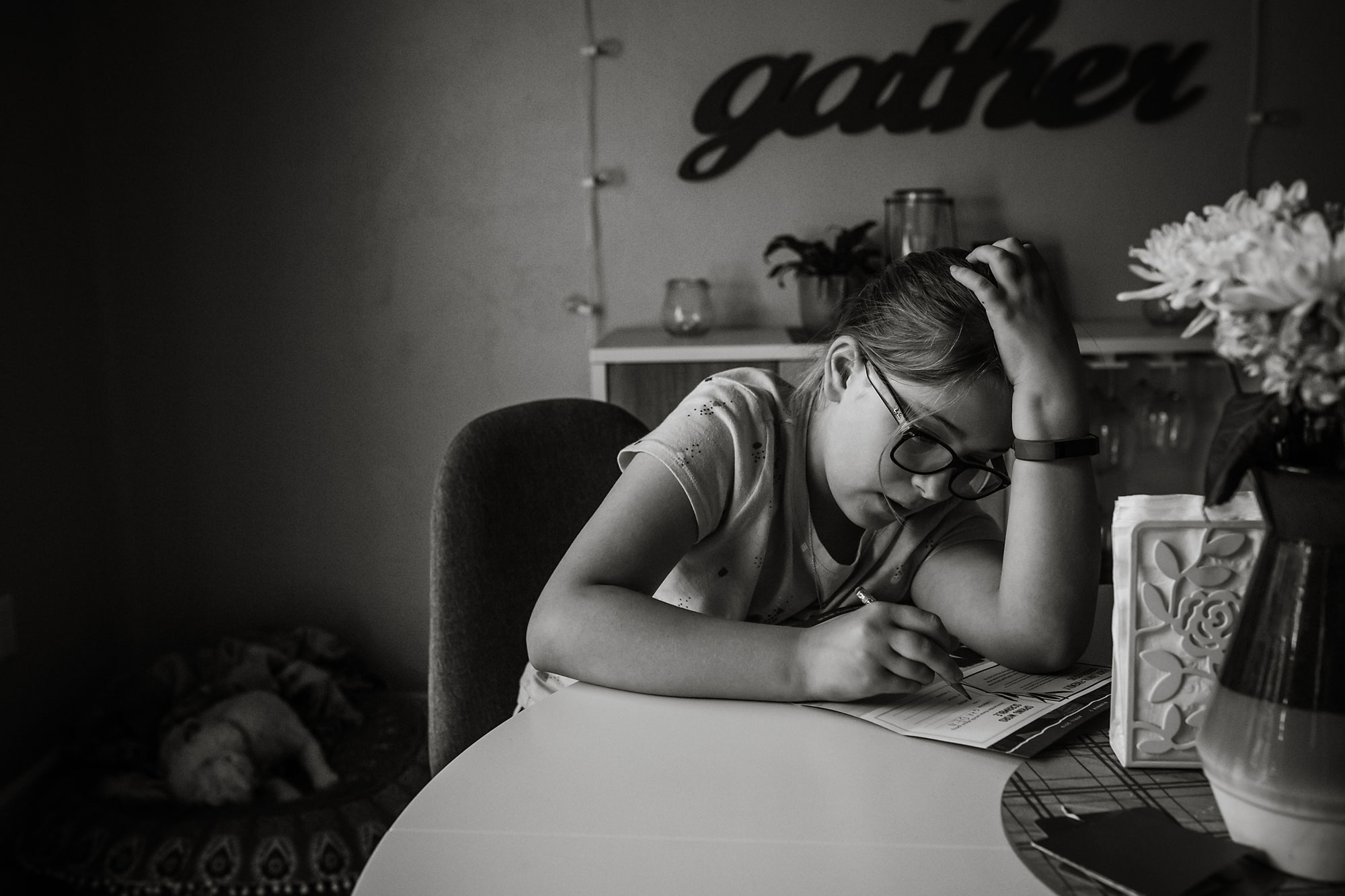 girl doing homework - documentary family photography