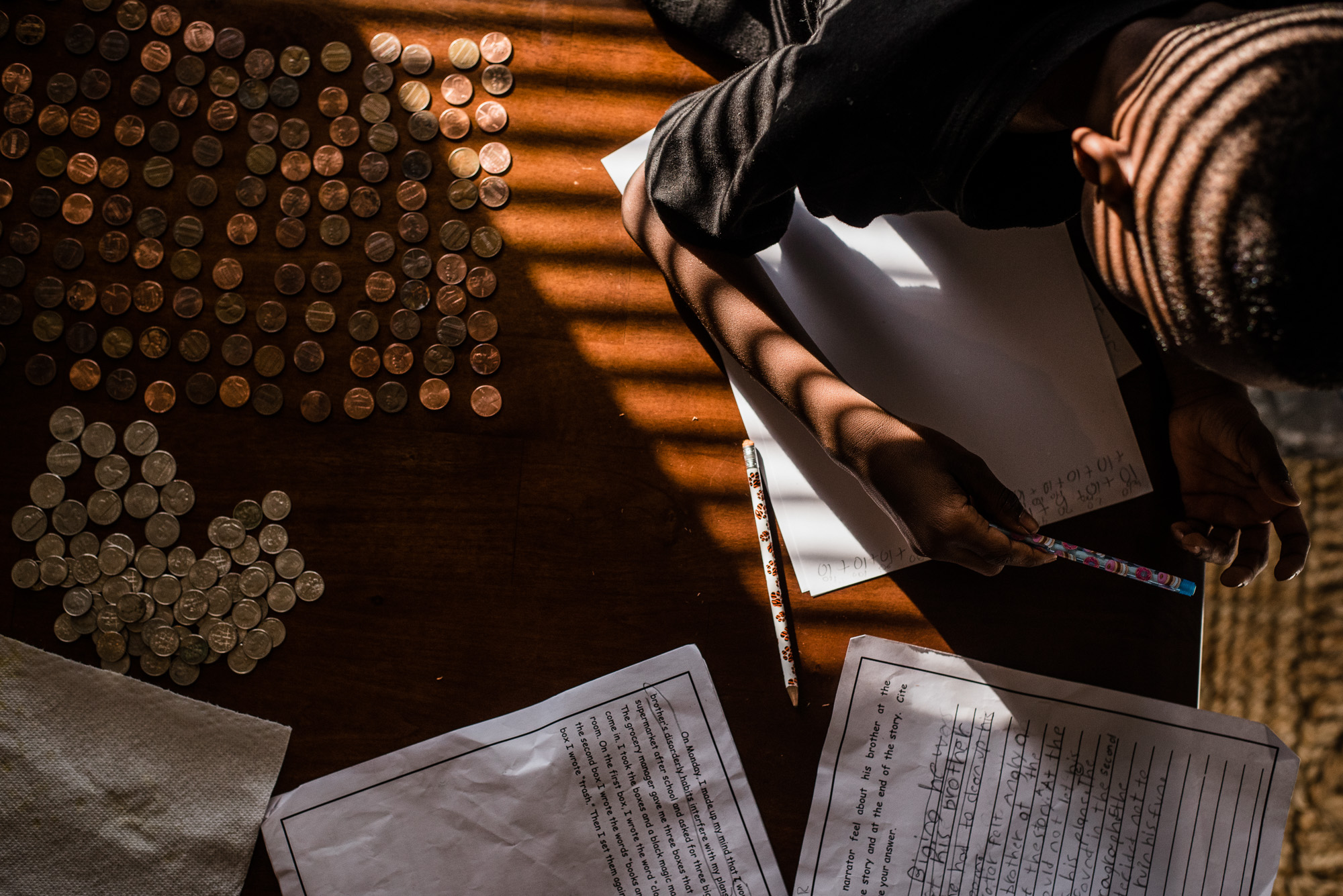 boy doing homework - documentary family photography