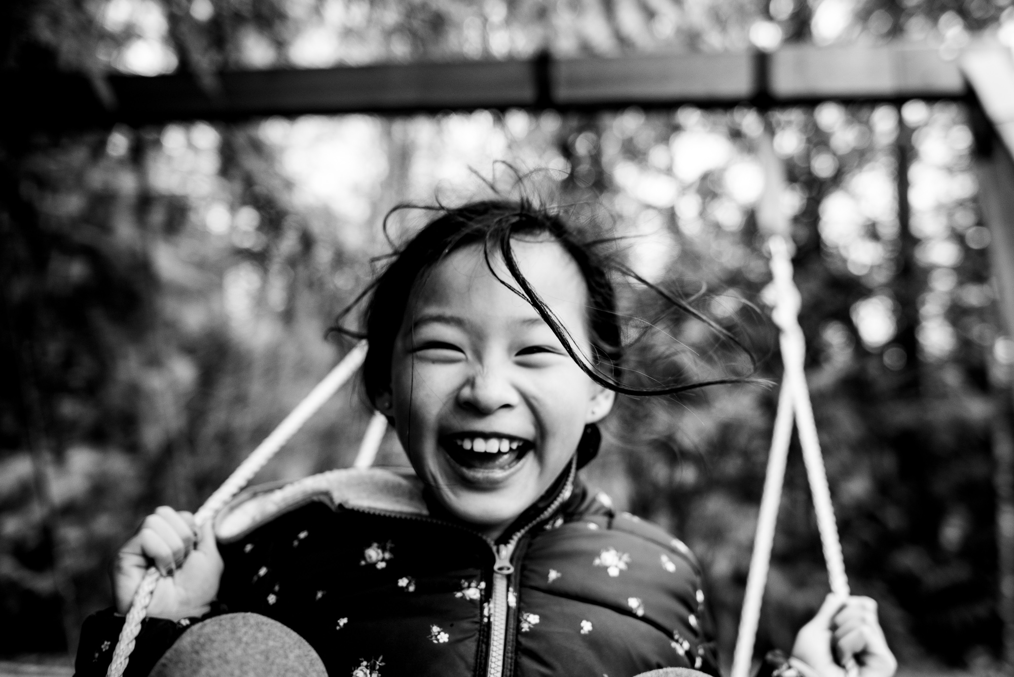 girl on swing - documentary family photography