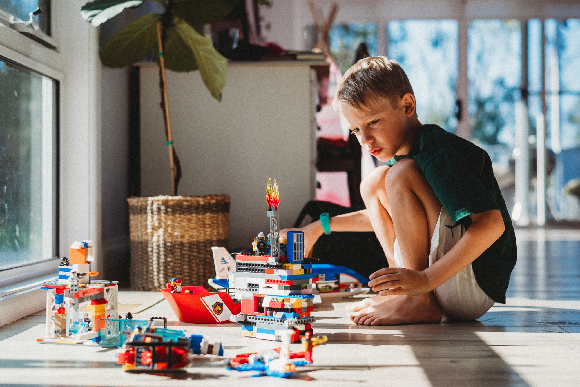 boy playing with legos - documentary family photography