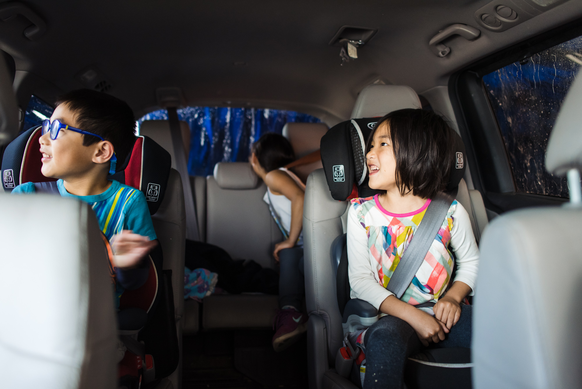 kids in car - documentary family photography