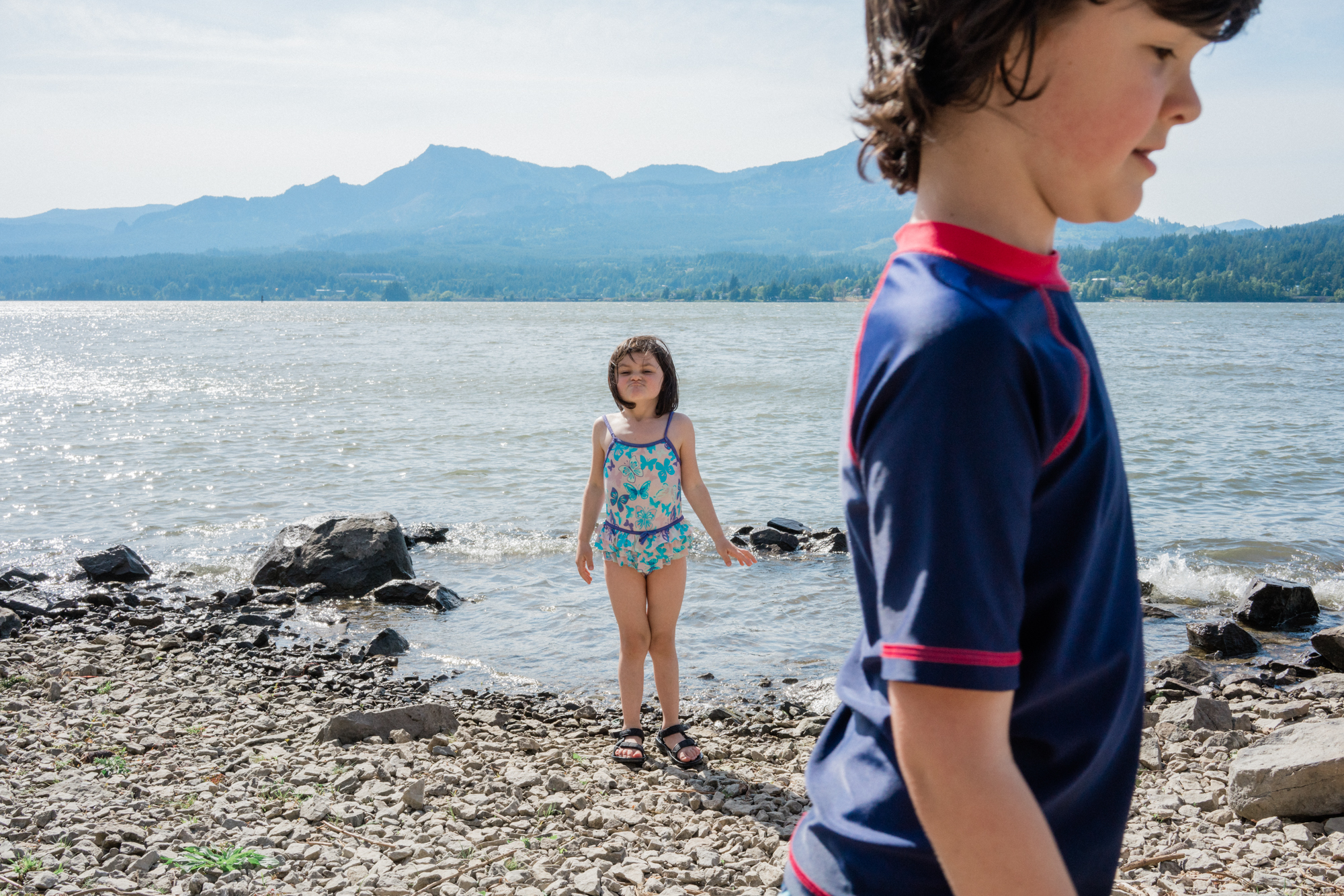 kids on rocky beach - documentary family photography
