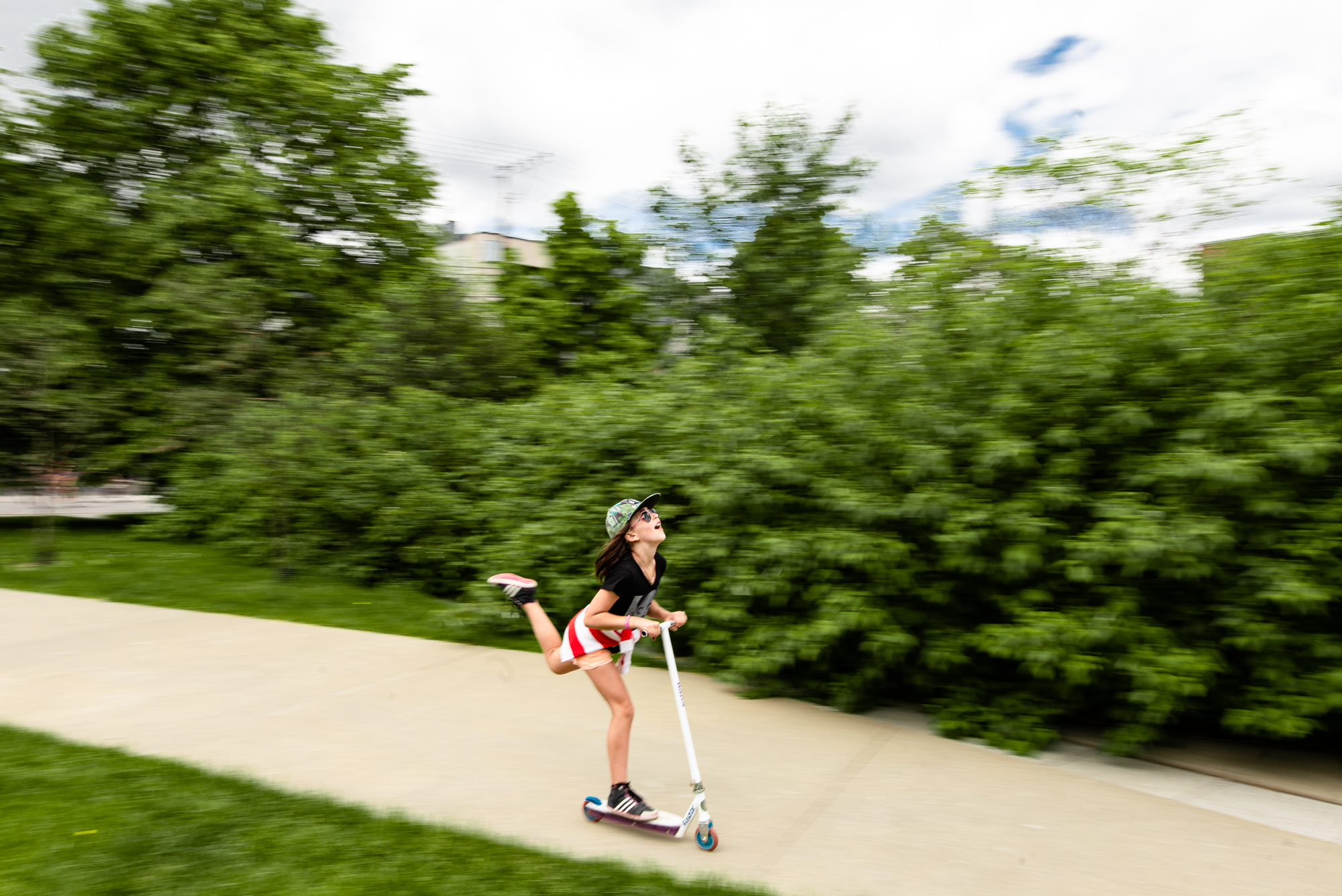 girl on scooter - documentary family photography