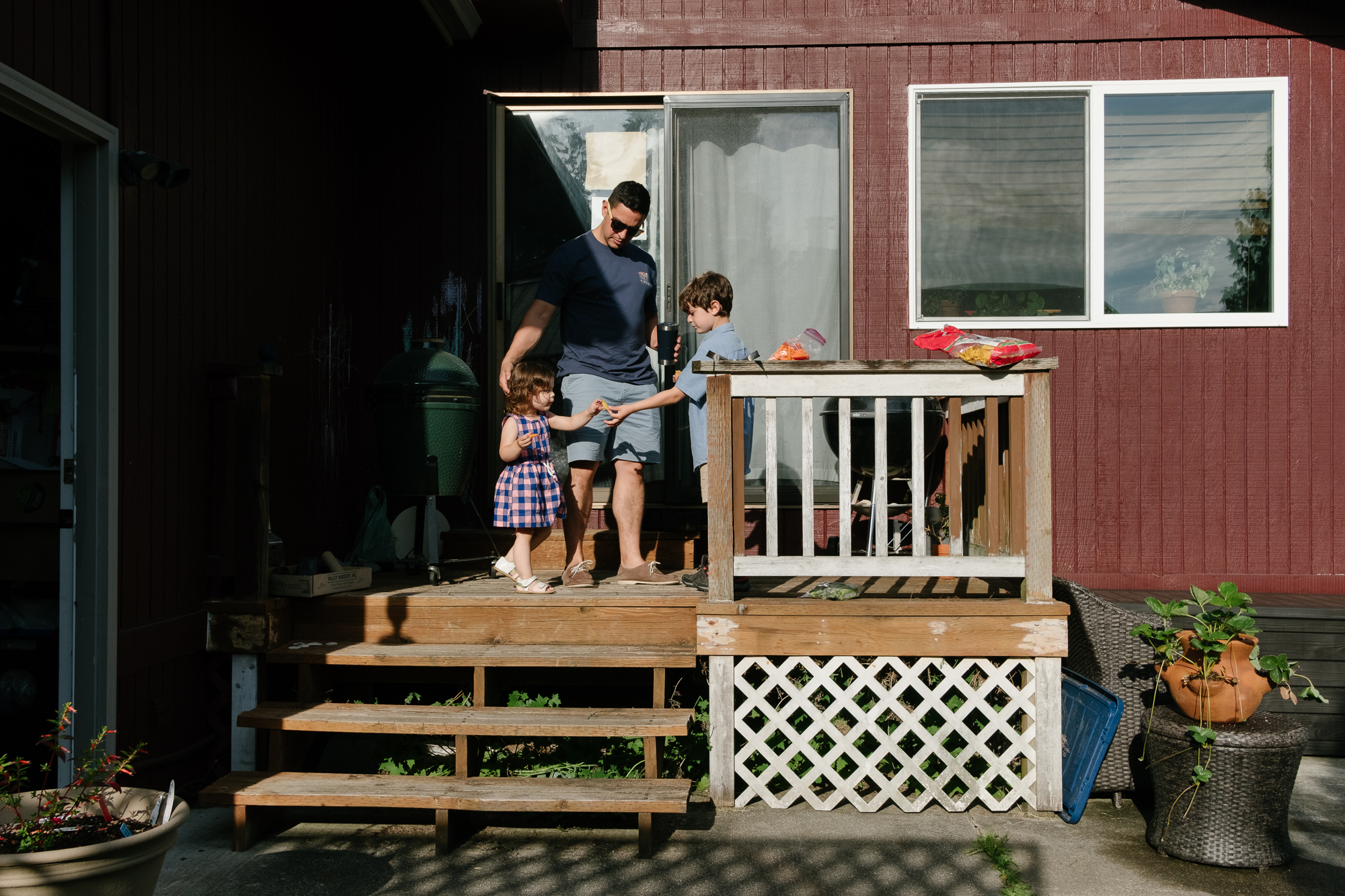 kids and dad on porch - documentary family photography