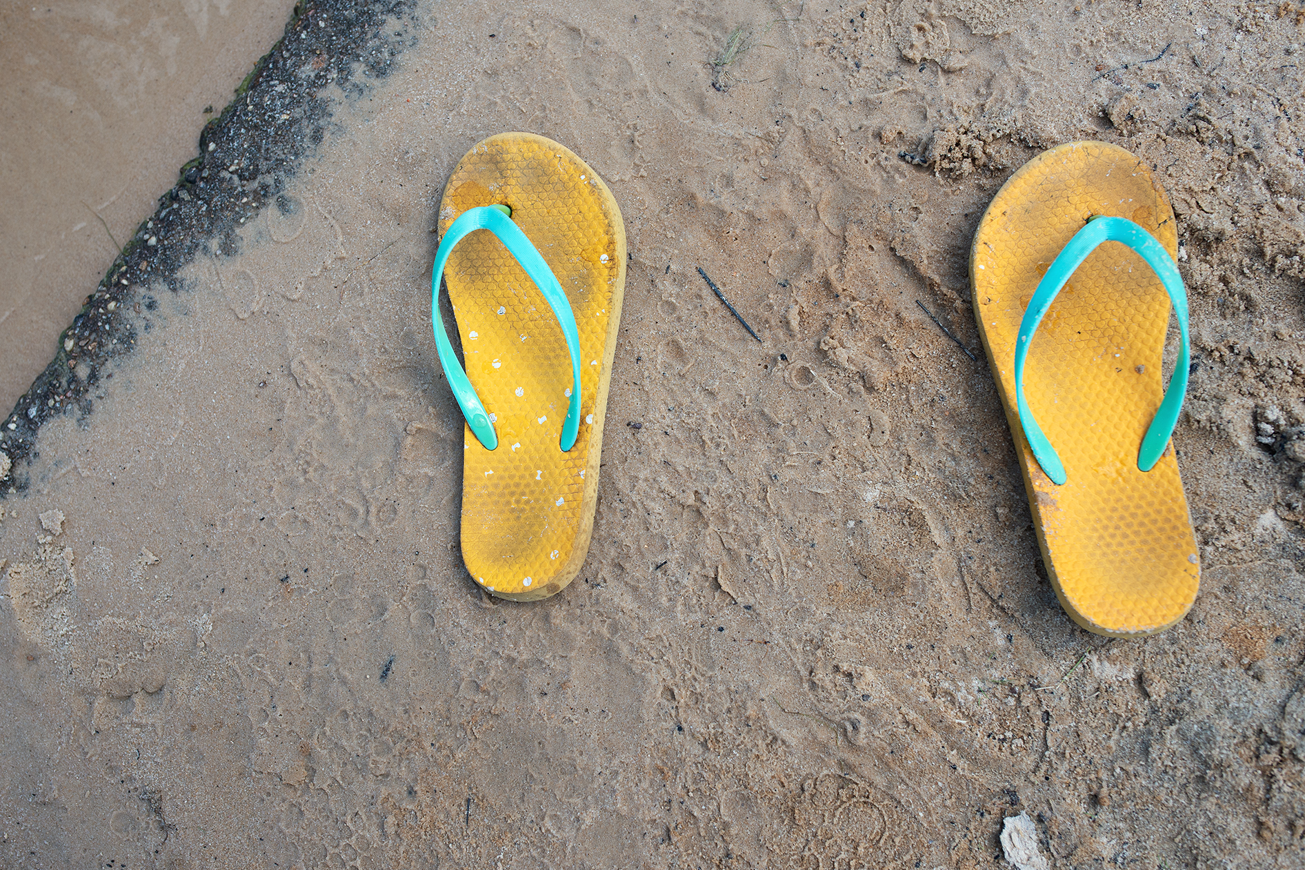 flip flops on sand - documentary family photography
