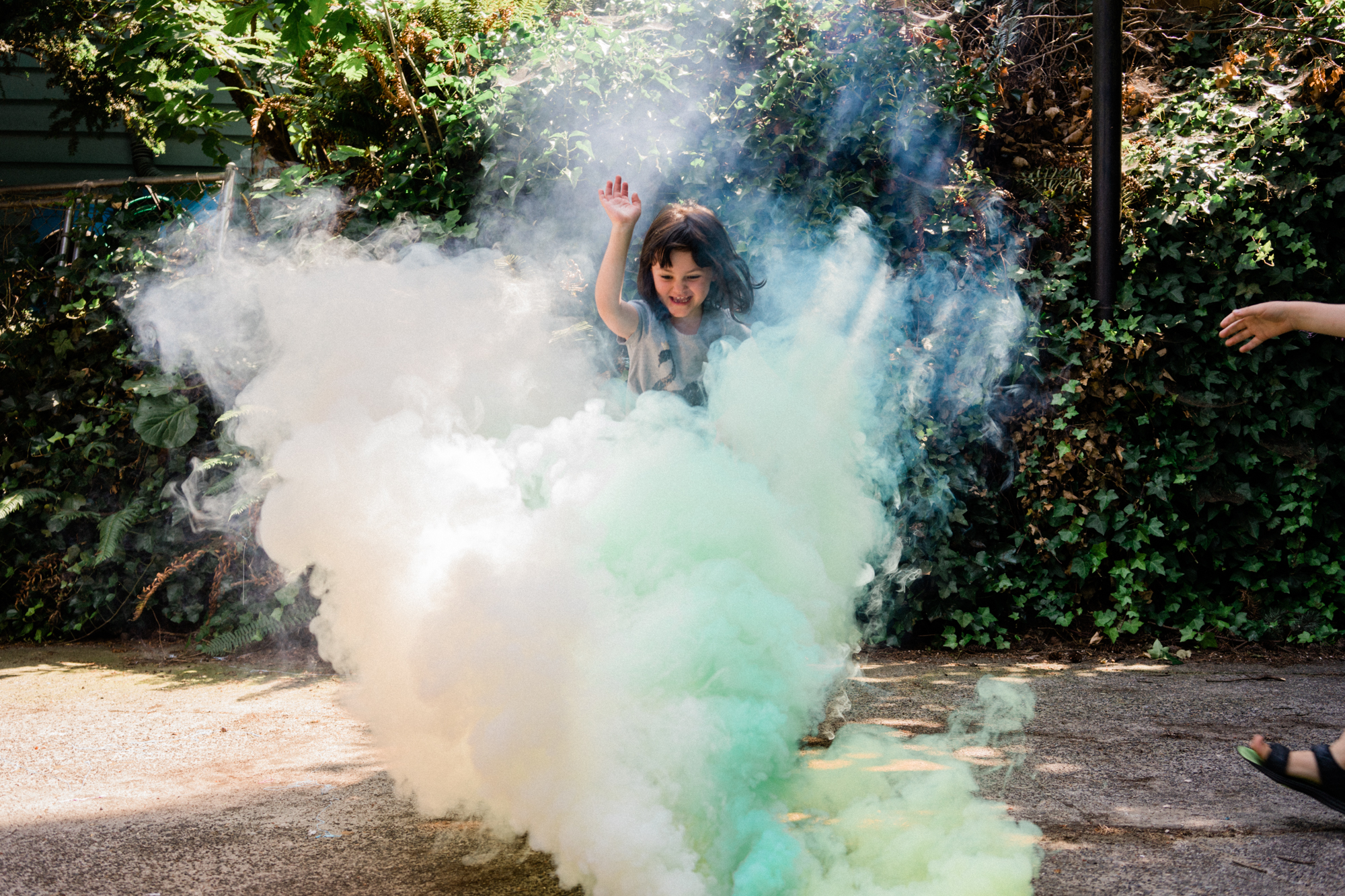 girl in smoke - documentary family photography