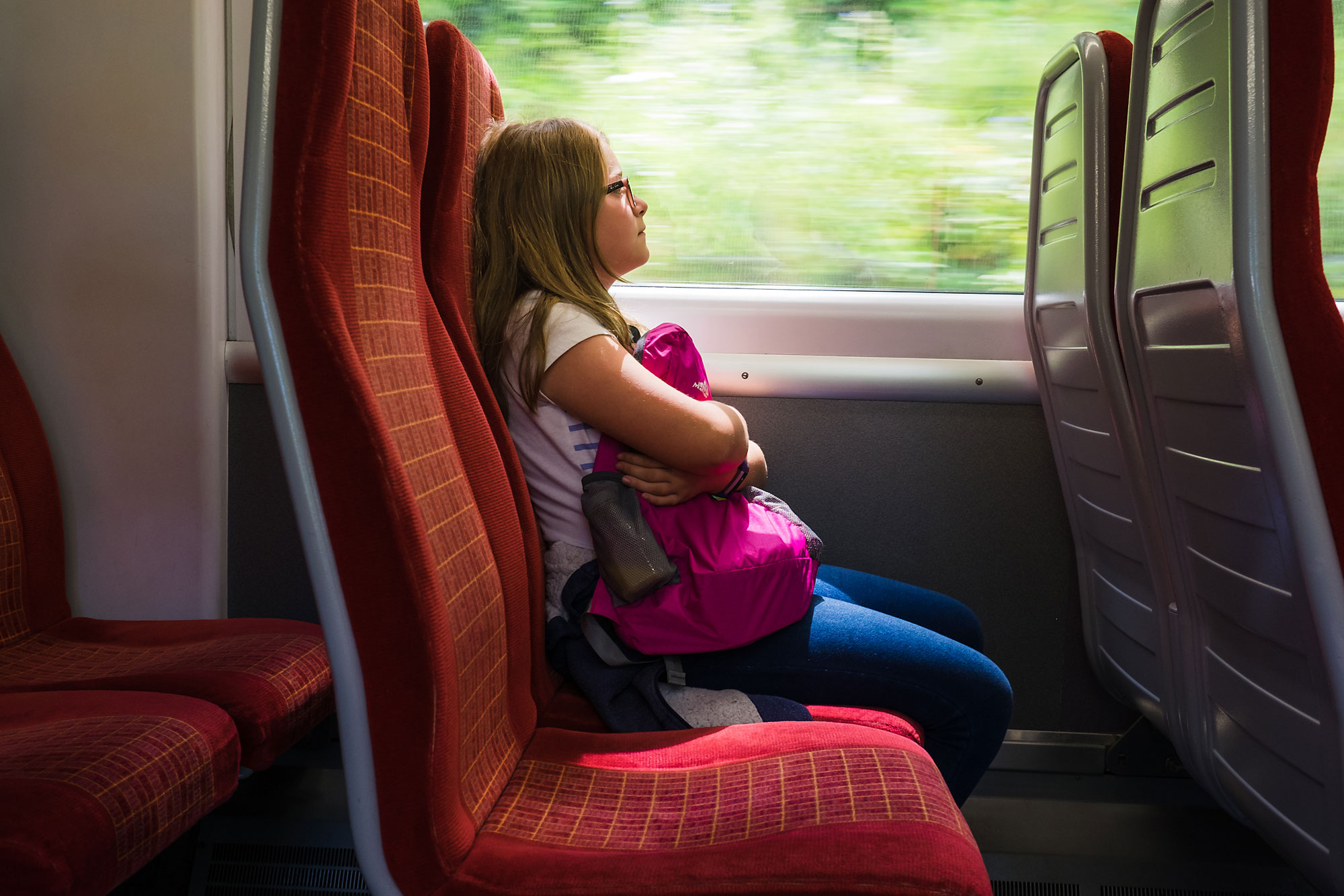 girl on train - documentary family photography