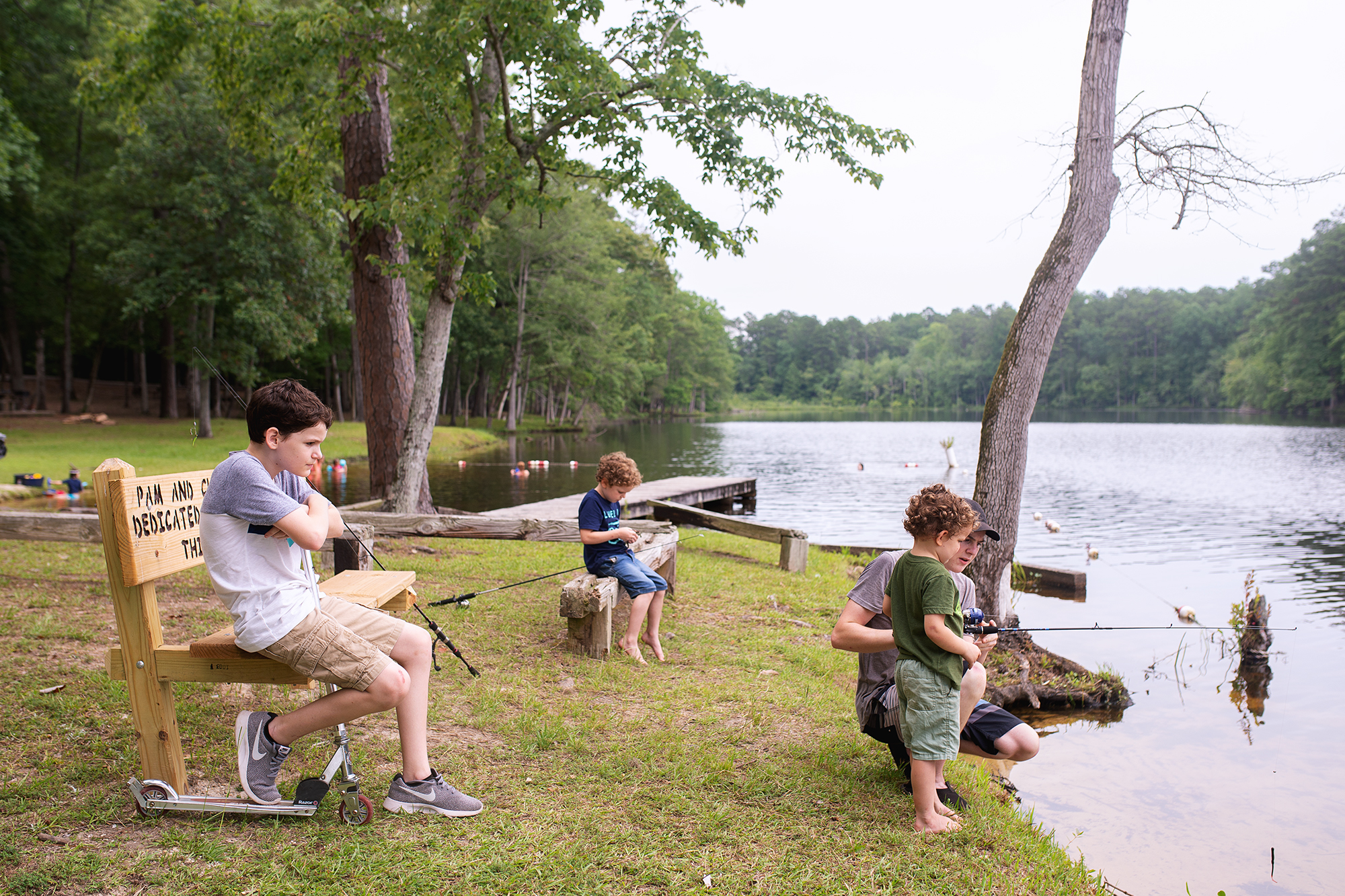 kids fishing at park - Documentary family photography