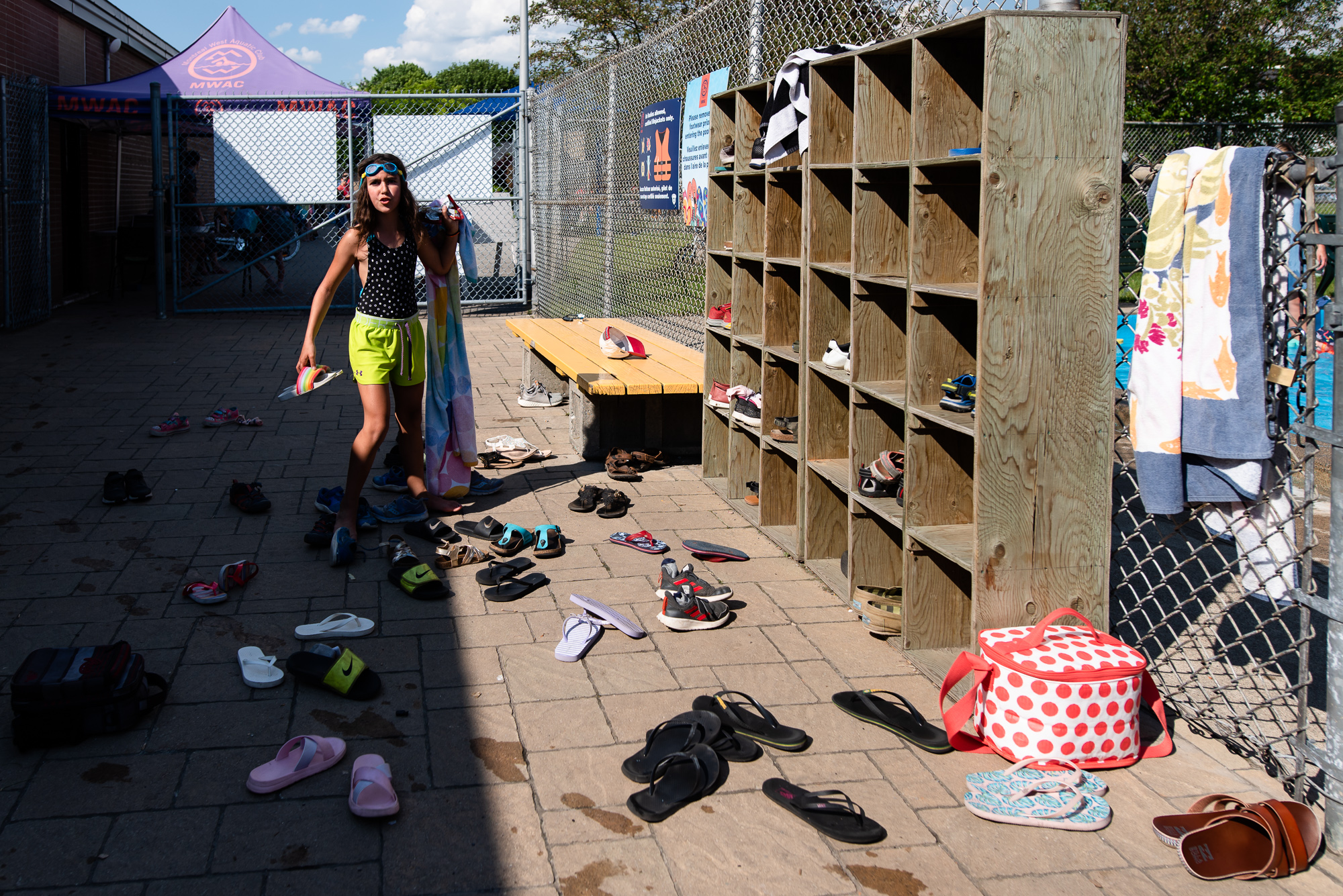 girl with shoes at pool - Documentary family photography