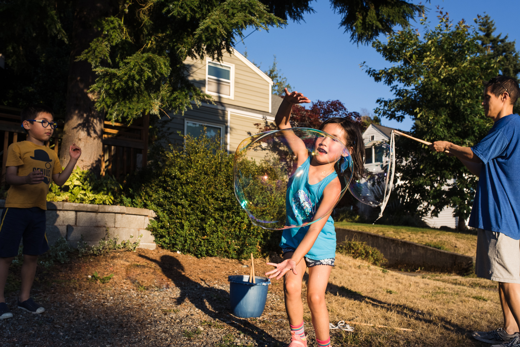 girl with bubbles - documentary family photography