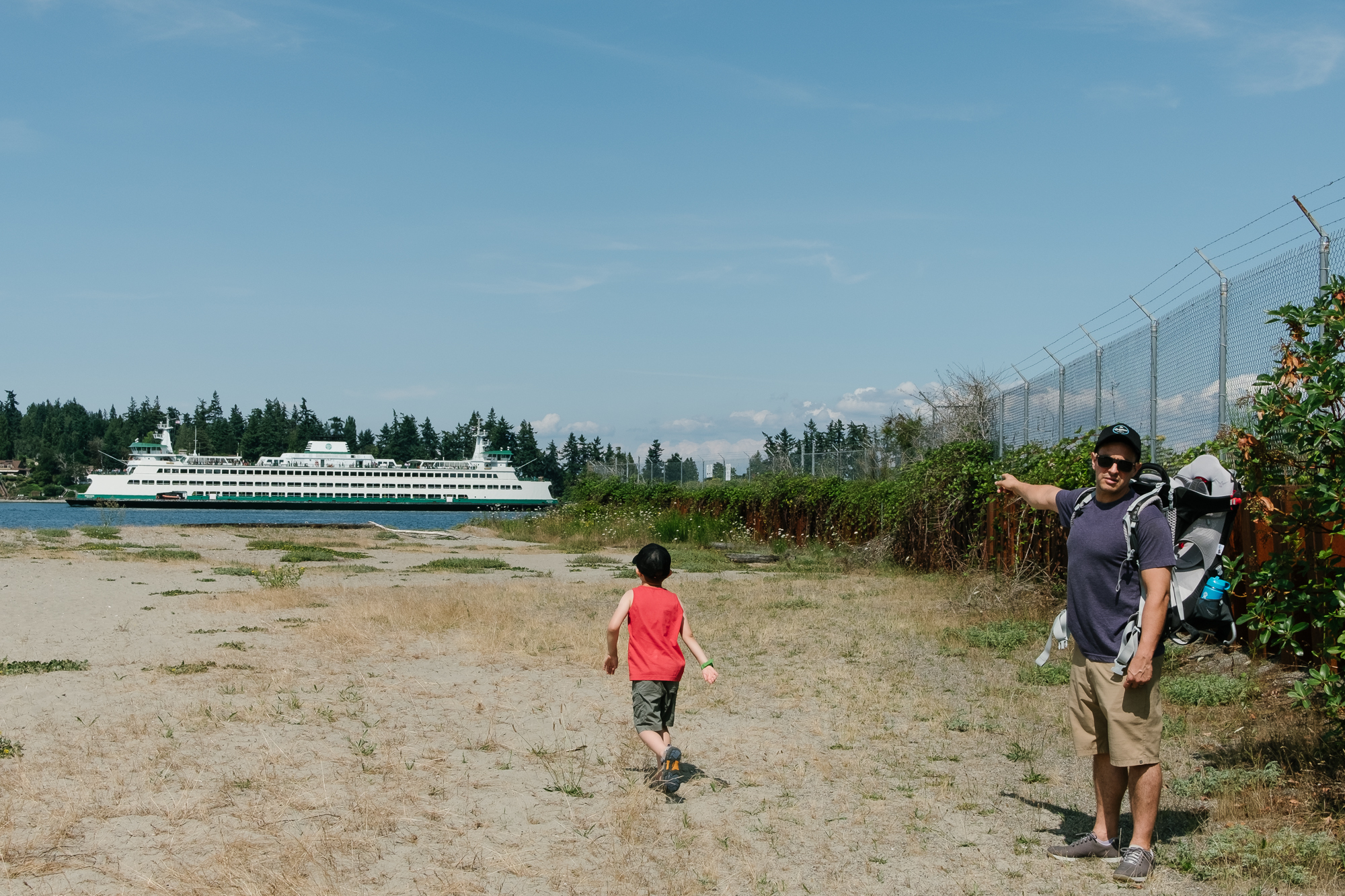family on shore viewing ferry - documentary family photography